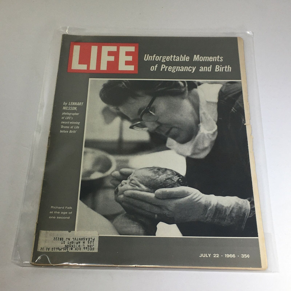Vintage Life Magazine from July 22, 1966, featuring 'Unforgettable Moments of Pregnancy and Birth'. The cover shows a black and white photo of a medical professional holding a newborn, highlighting the theme of childbirth.