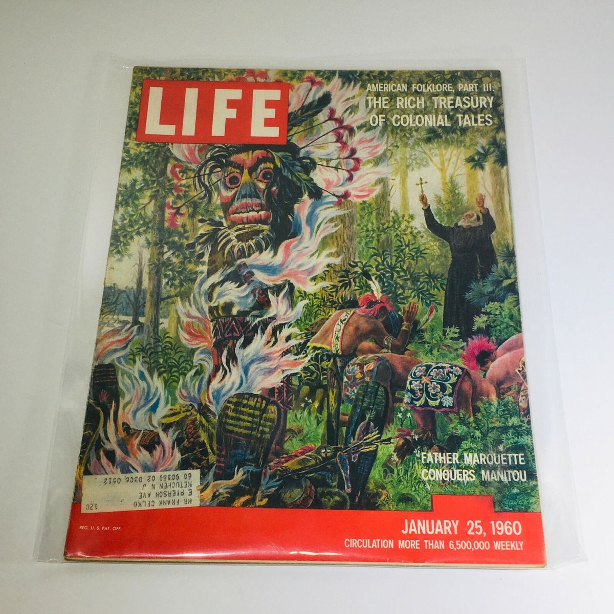 Cover of VTG Life Magazine dated January 25, 1960, featuring vibrant artwork depicting Father Marquette conquering Manitou, surrounded by colonial folklore themes.