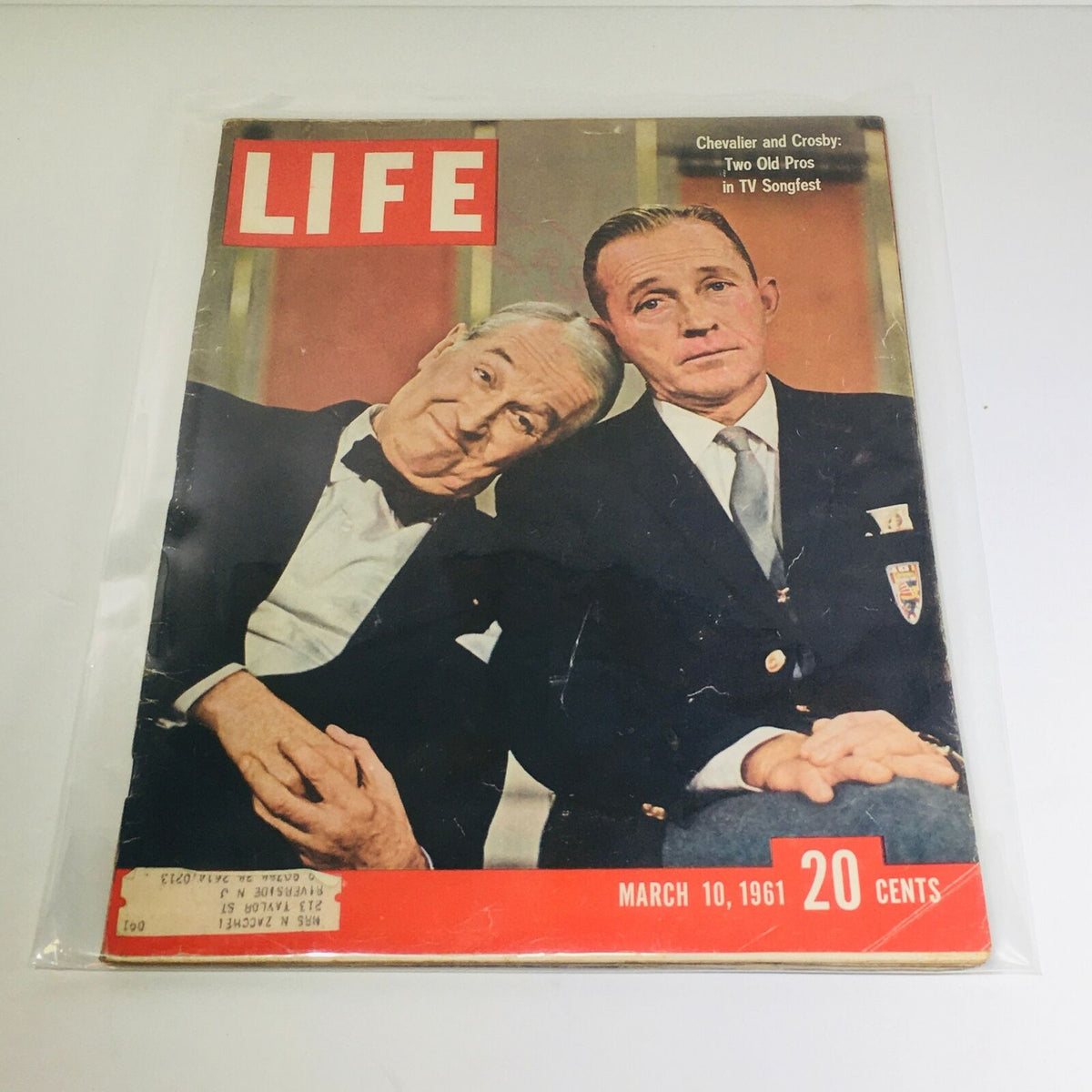 Vintage Life Magazine cover from March 10, 1961, featuring Chevalier and Crosby titled "Two Old Pro's in TV Songfest" with a colorful design and retro aesthetic.