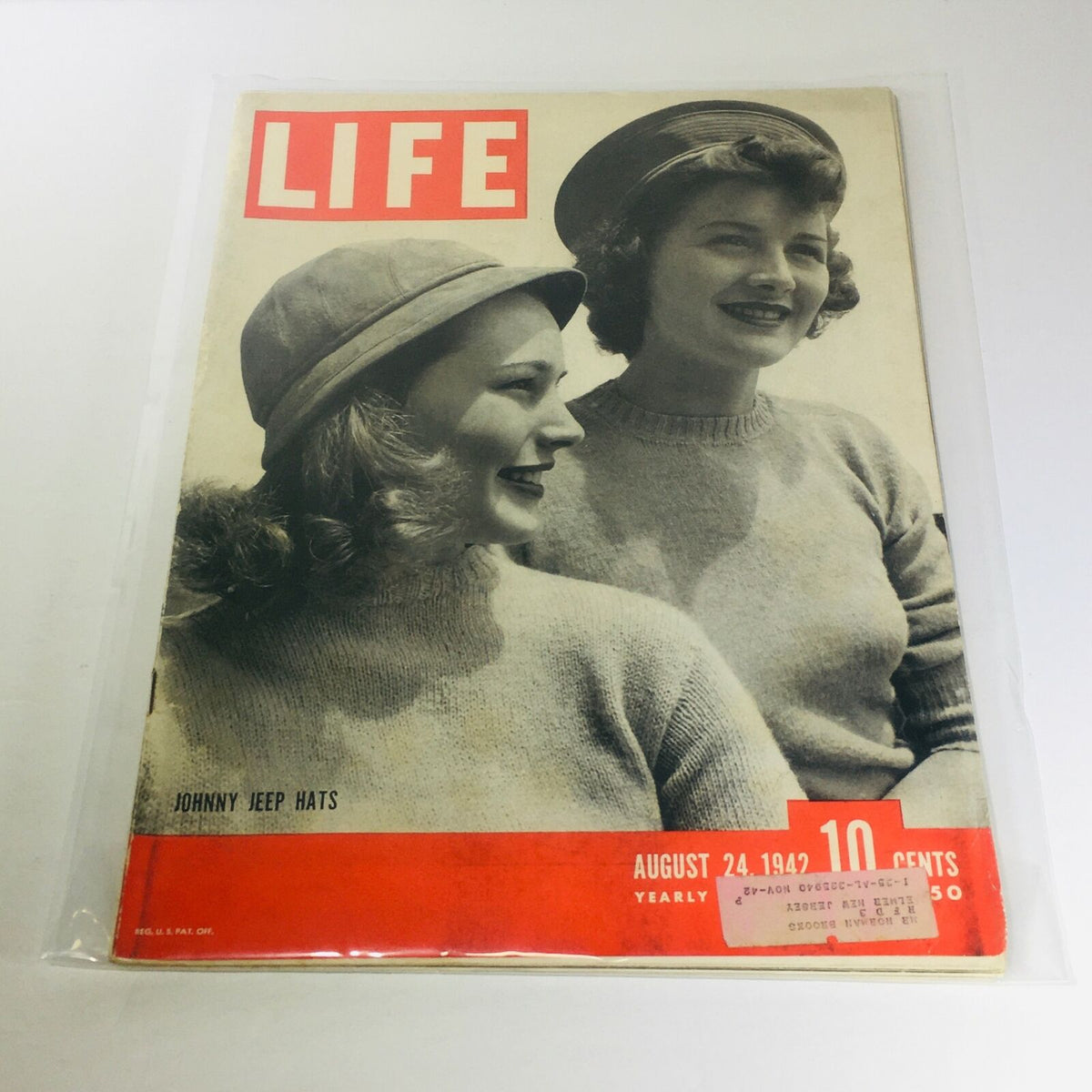 Vintage Life Magazine cover from August 24, 1942 featuring Johnny Jeep Hats advertisement, showcasing two women in stylish hats, evoking nostalgia for retro advertising.