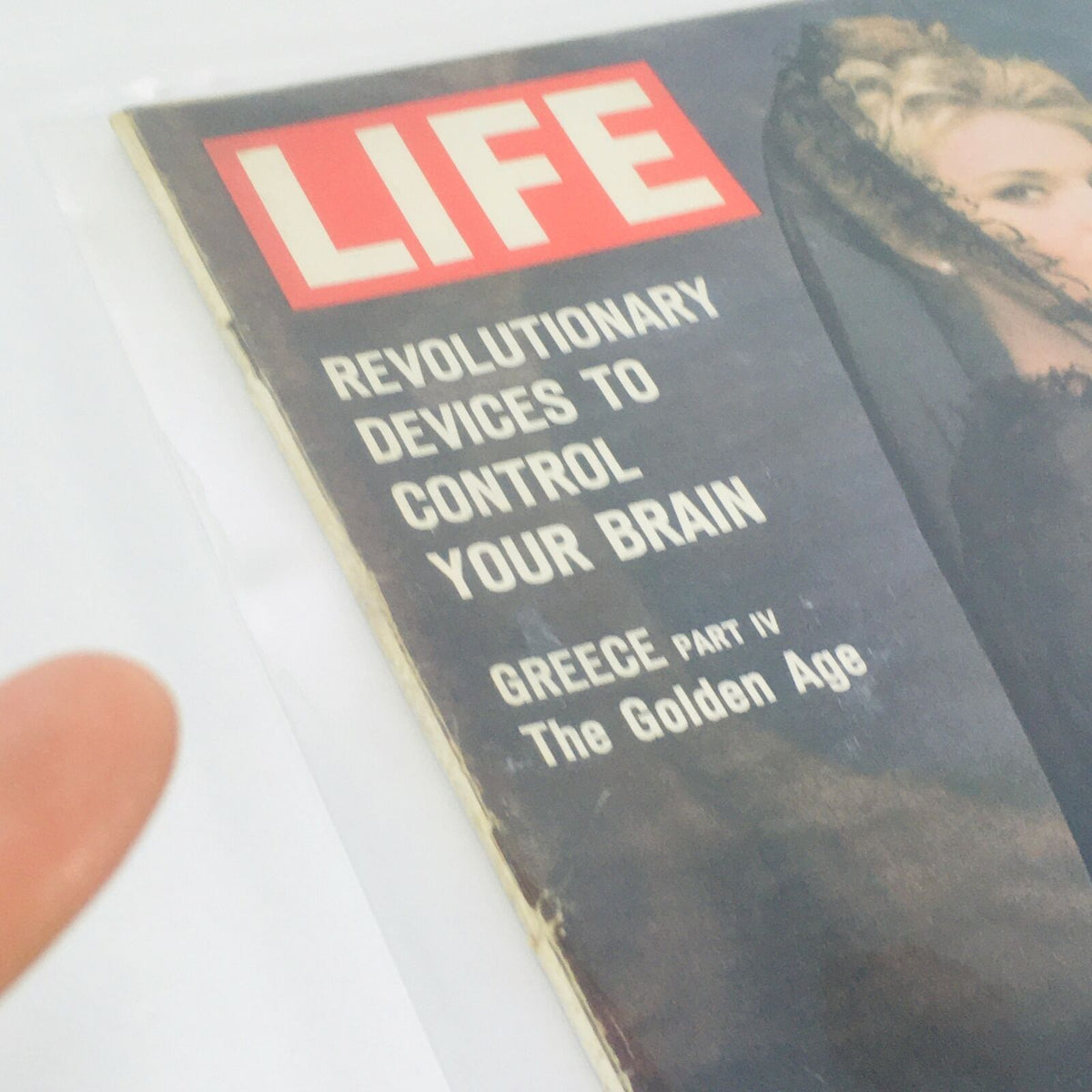 Side view of the VTG Life Magazine cover dated March 8, 1963, with title details including 'Revolutionary Devices to Control Your Brain' and 'Greece Part IV: The Golden Age'.