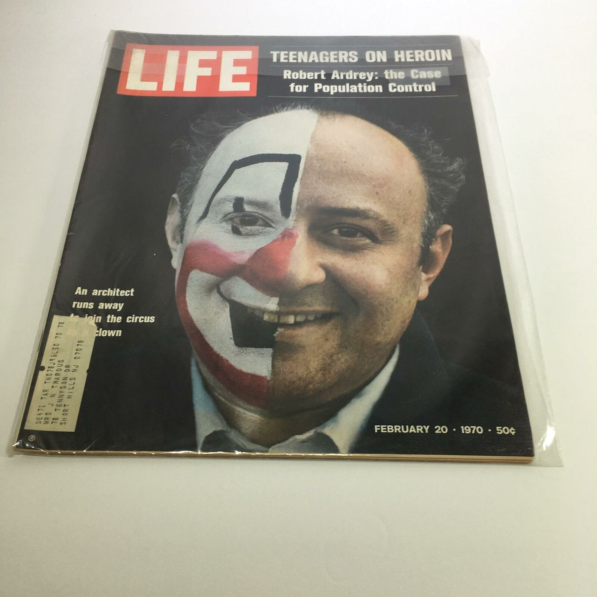 Cover of Life Magazine February 20, 1970 featuring Robert Ardrey's article 'The Case for Population Control', showcasing a man with half of his face painted as a clown.