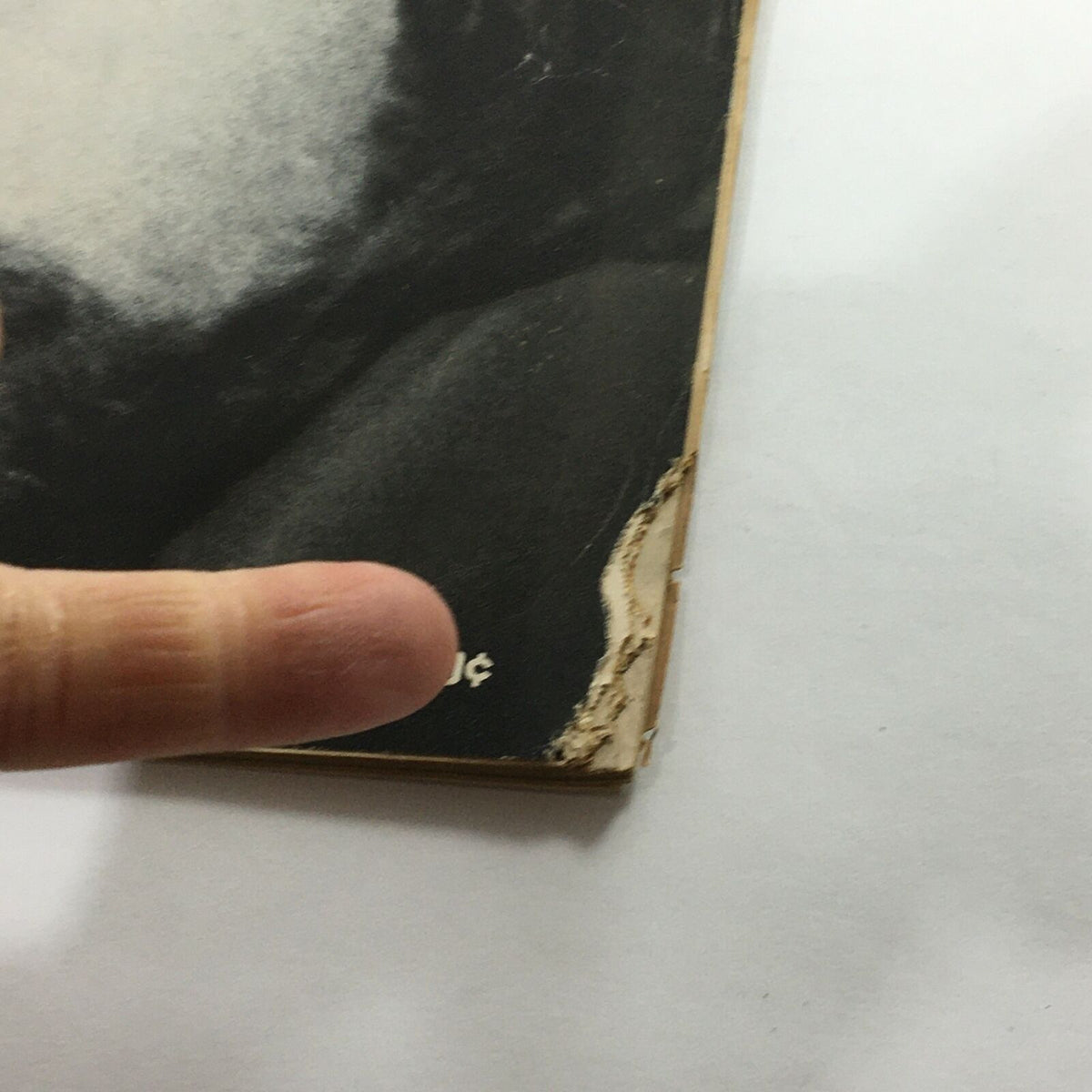 Close-up of the edge of the May 28, 1971 VTG Life Magazine featuring Chris Brown, highlighting wear and imperfections typical for vintage items, including frayed edges.