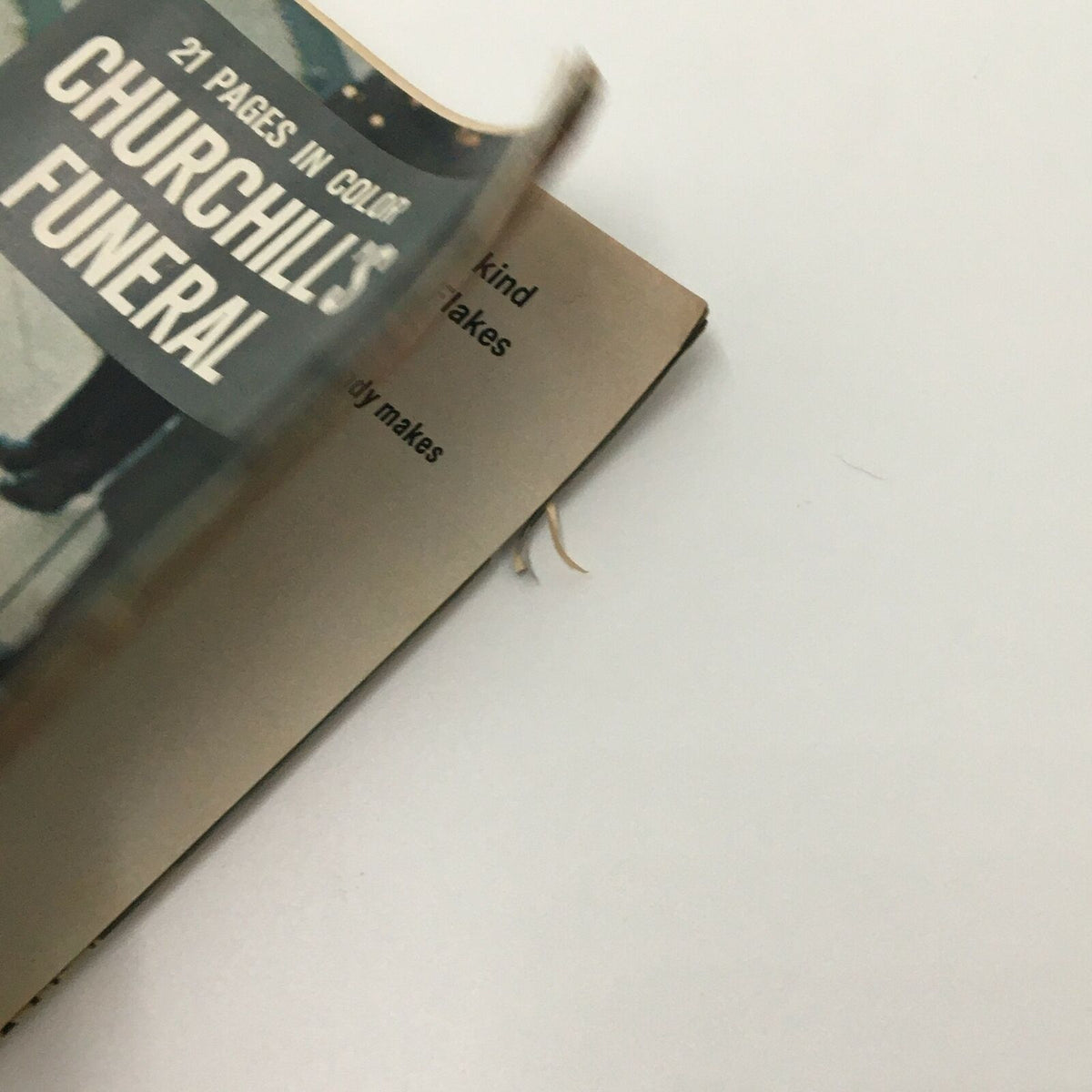 Inside view of the VTG Life Magazine February 5, 1965, showing pages from the article about Churchill's Funeral, including the magazine's display and design.