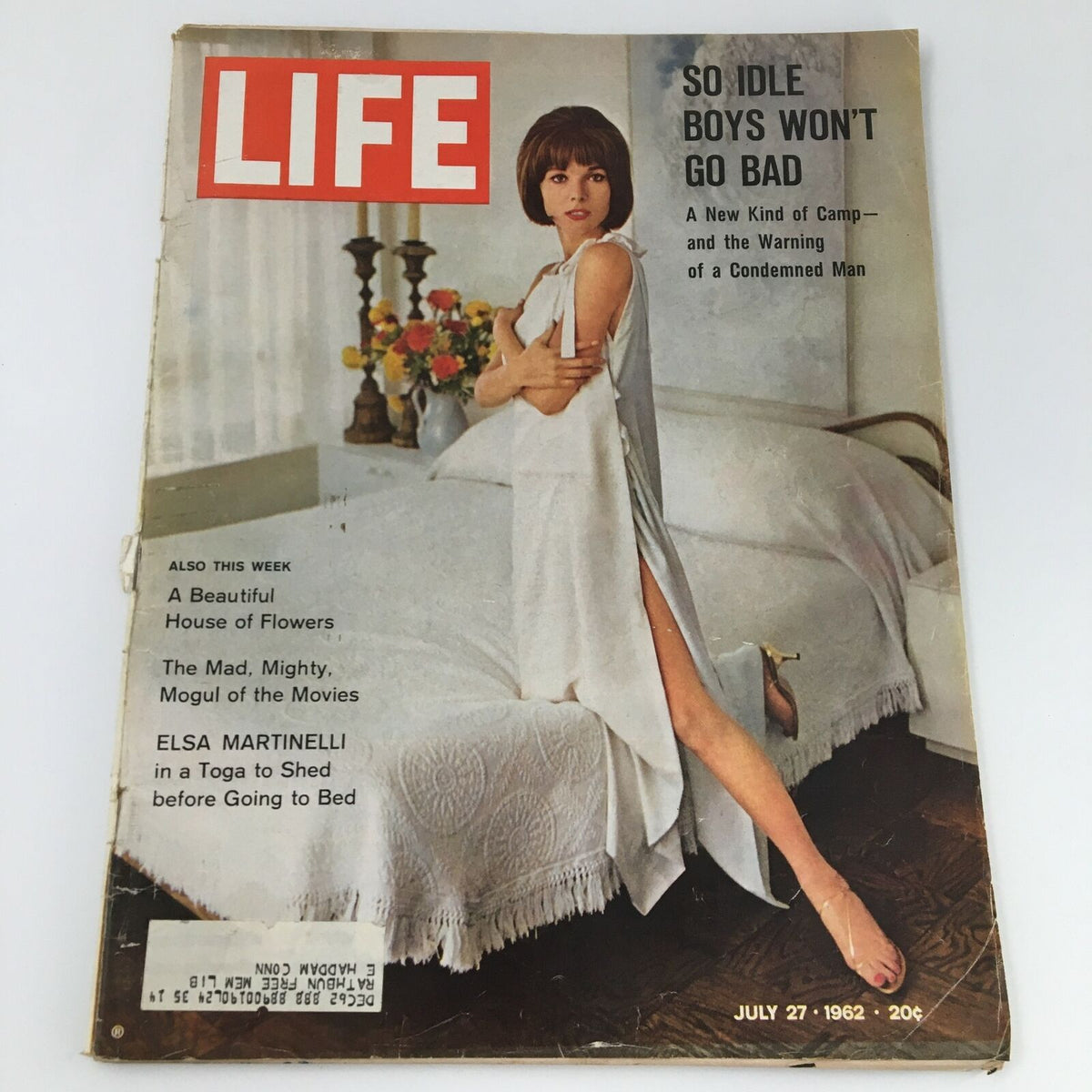 VTG Life Magazine July 27 1962 featuring Italian actress Elsa Martinelli on the cover, showcasing her in a white dress with a bedroom backdrop and floral arrangement.