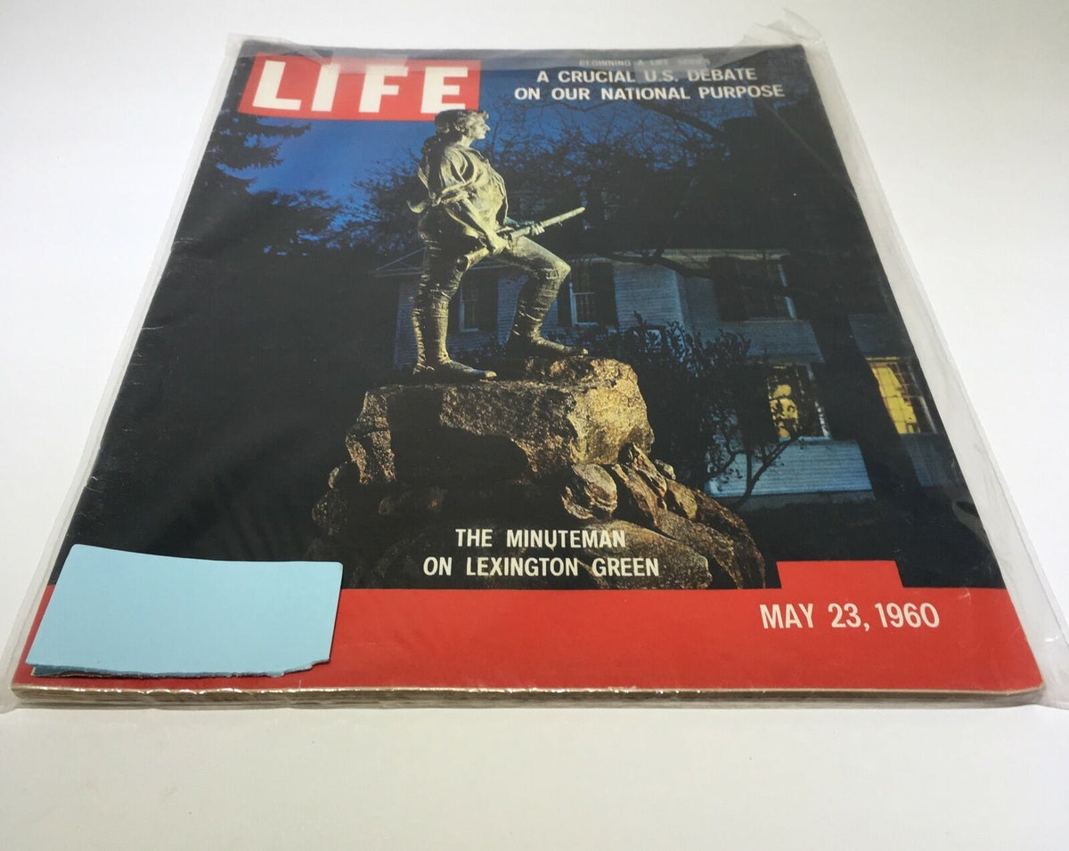 Vintage Life Magazine cover from May 23, 1960 featuring 'The Minuteman On Lexington Green' statue, highlighting American history. The magazine is protected in a clear plastic wrap.