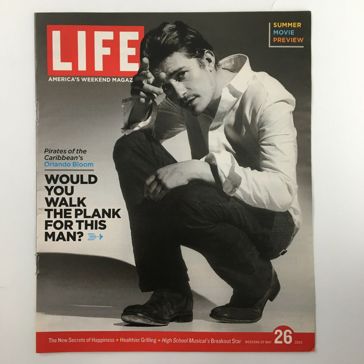 Life Magazine newspaper insert featuring Orlando Bloom on the cover, published on May 26, 2006. The magazine includes a summer movie preview and a headline asking if you would walk the plank for this man. The image showcases Orlando Bloom in a stylish pose.