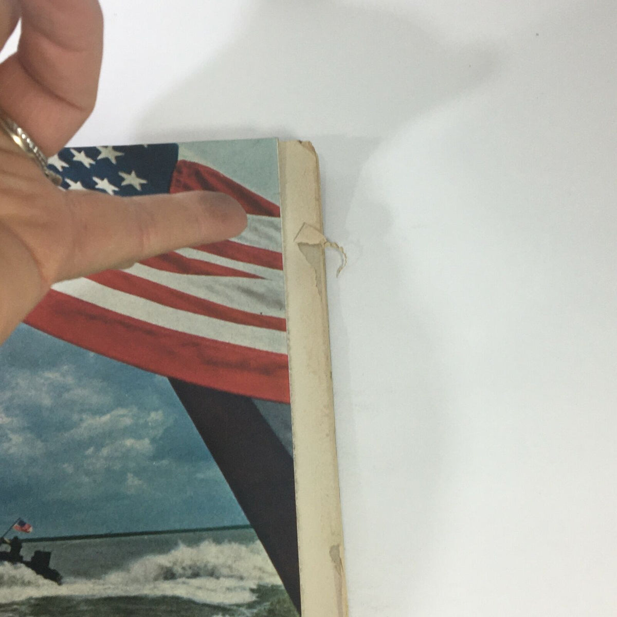 Close-up view of the VTG Life Magazine January 13 1967 cover highlighting the American flag and edge of the magazine, emphasizing minor wear and historical significance.