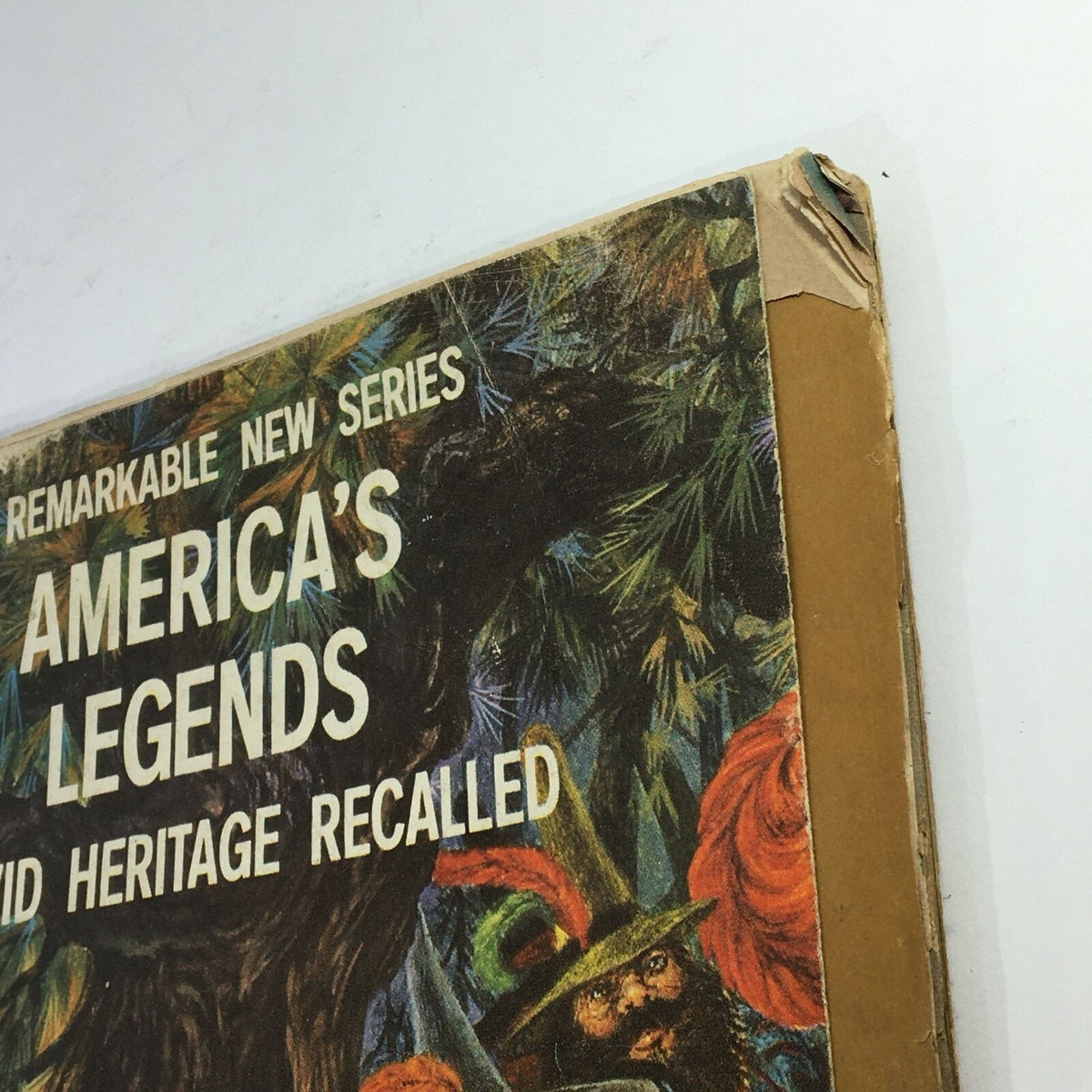 Side view of the VTG Life Magazine August 31 1959, showcasing the faded titles and wear on the spine, characteristic of vintage magazines.