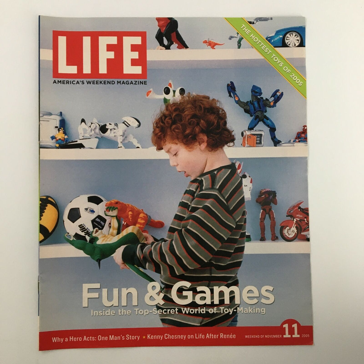 Life Magazine Newspaper Insert titled 'World of Toy-Making' dated November 11, 2005, featuring a child playing with toys, reflecting the theme of fun and games in the toy industry.