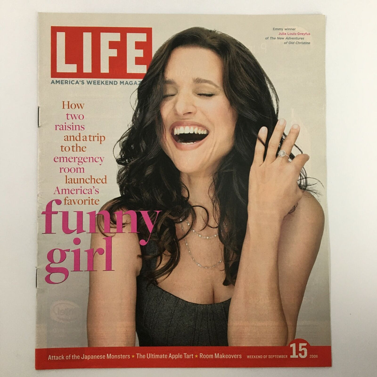 Life Magazine newspaper insert featuring Julia Louis-Dreyfus, dated September 15, 2006, showcasing her as America's favorite funny girl with a joyful smile.