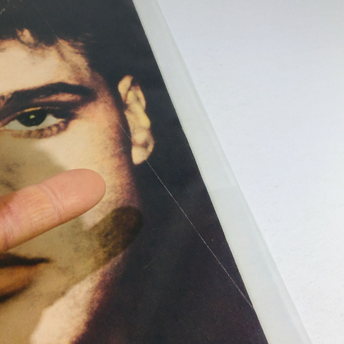 Close-up view of the vintage June 1990 Life Magazine cover featuring Elvis Presley, showcasing the magazine's condition details and historical context related to his legacy and Tom Cruise.