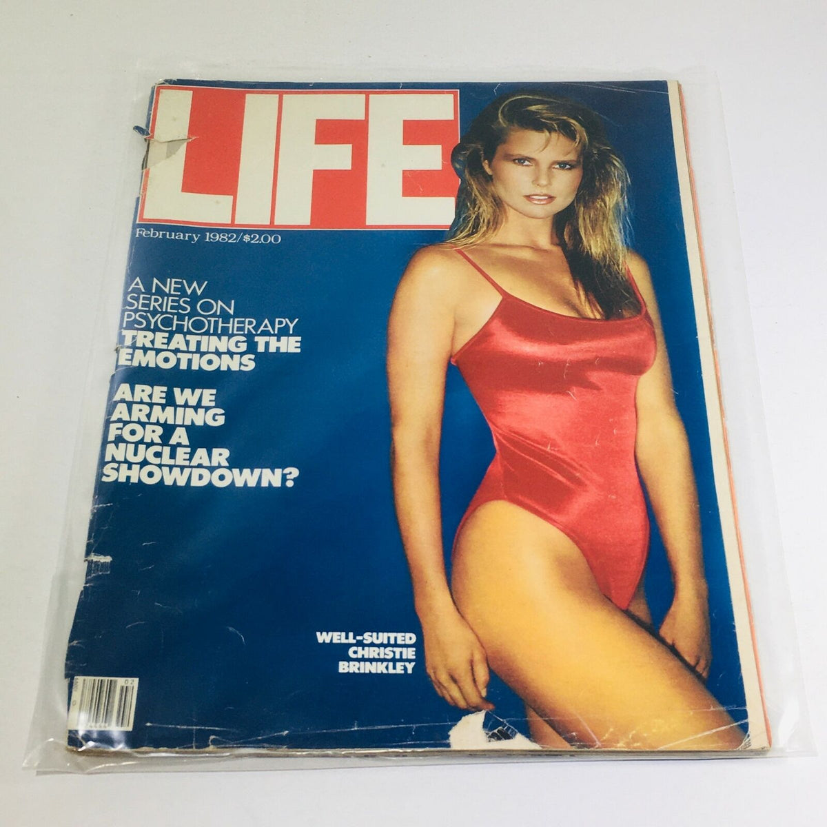 VTG Life Magazine cover from February 1982 featuring Christie Brinkley in a red swimsuit, highlighting topics like psychotherapy and cultural issues of the time.
