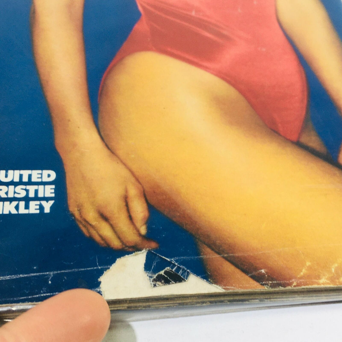 Detailed view of the edge of the VTG Life Magazine cover from February 1982, featuring small imperfections and wear typical of a vintage item.