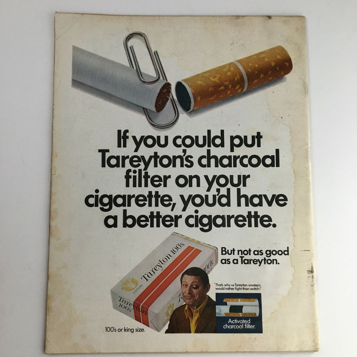 Back cover advertisement of a Tareyton cigarette package, promoting the benefits of the charcoal filter, ideal for collectors of vintage magazines and advertisements.