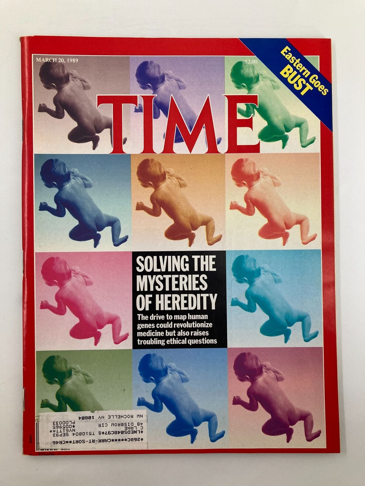 Cover of VTG Time Magazine from March 20, 1989, featuring the title 'Solving The Mysteries of Heredity' with a vibrant design showcasing babies in various colors symbolizing genetic research.