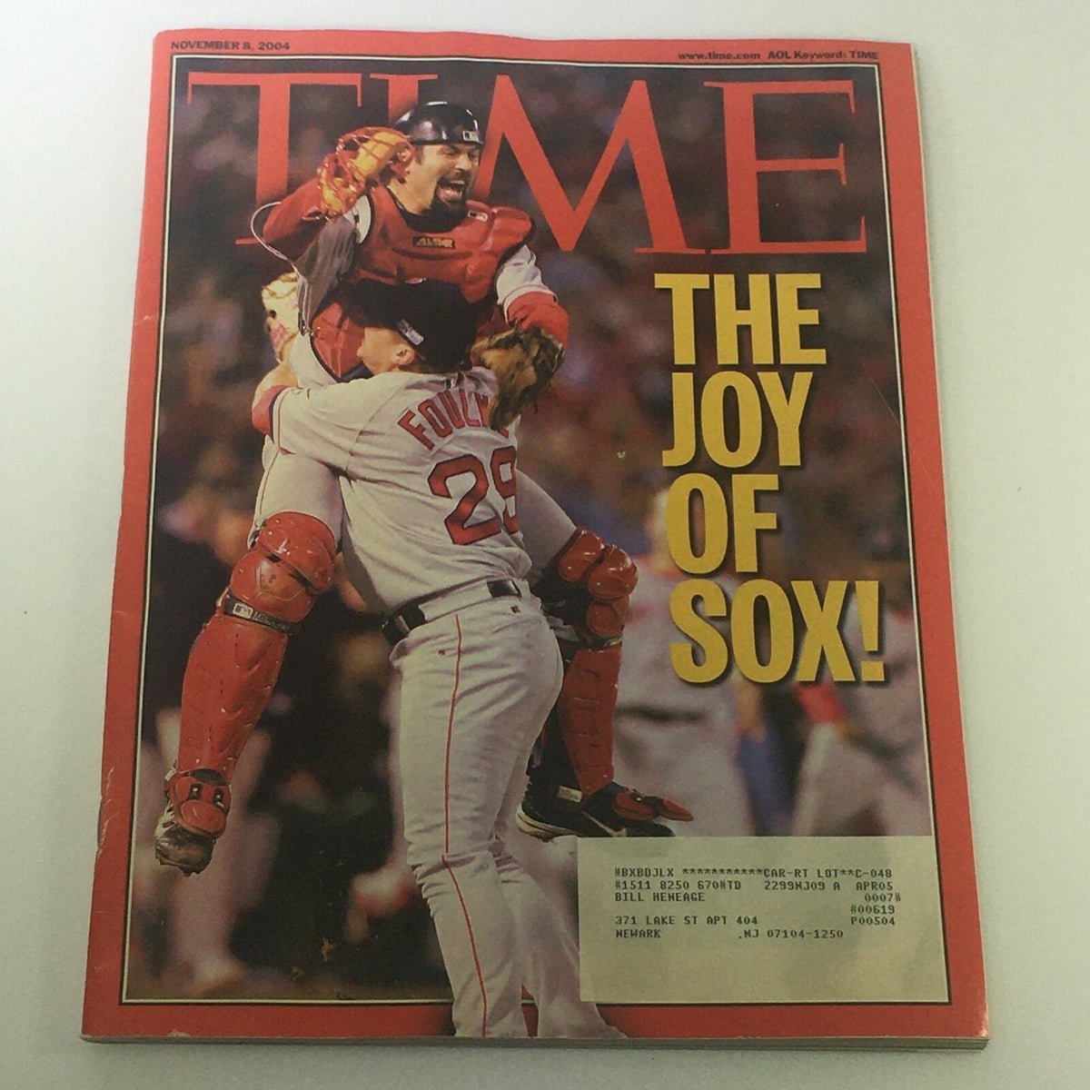 Time Magazine November 8, 2004 cover featuring a triumphant moment with Boston Red Sox players celebrating, highlighting the joy of Sox and their victory in clinching the World Series.