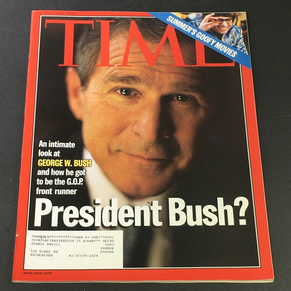 VTG Time Magazine cover featuring President George Bush, dated June 21, 1999, showcasing a close-up image of Bush with an article on his political rise. Includes a reference to Mike Myers in the top corner with the theme 'Summer's Goofy Movies'.