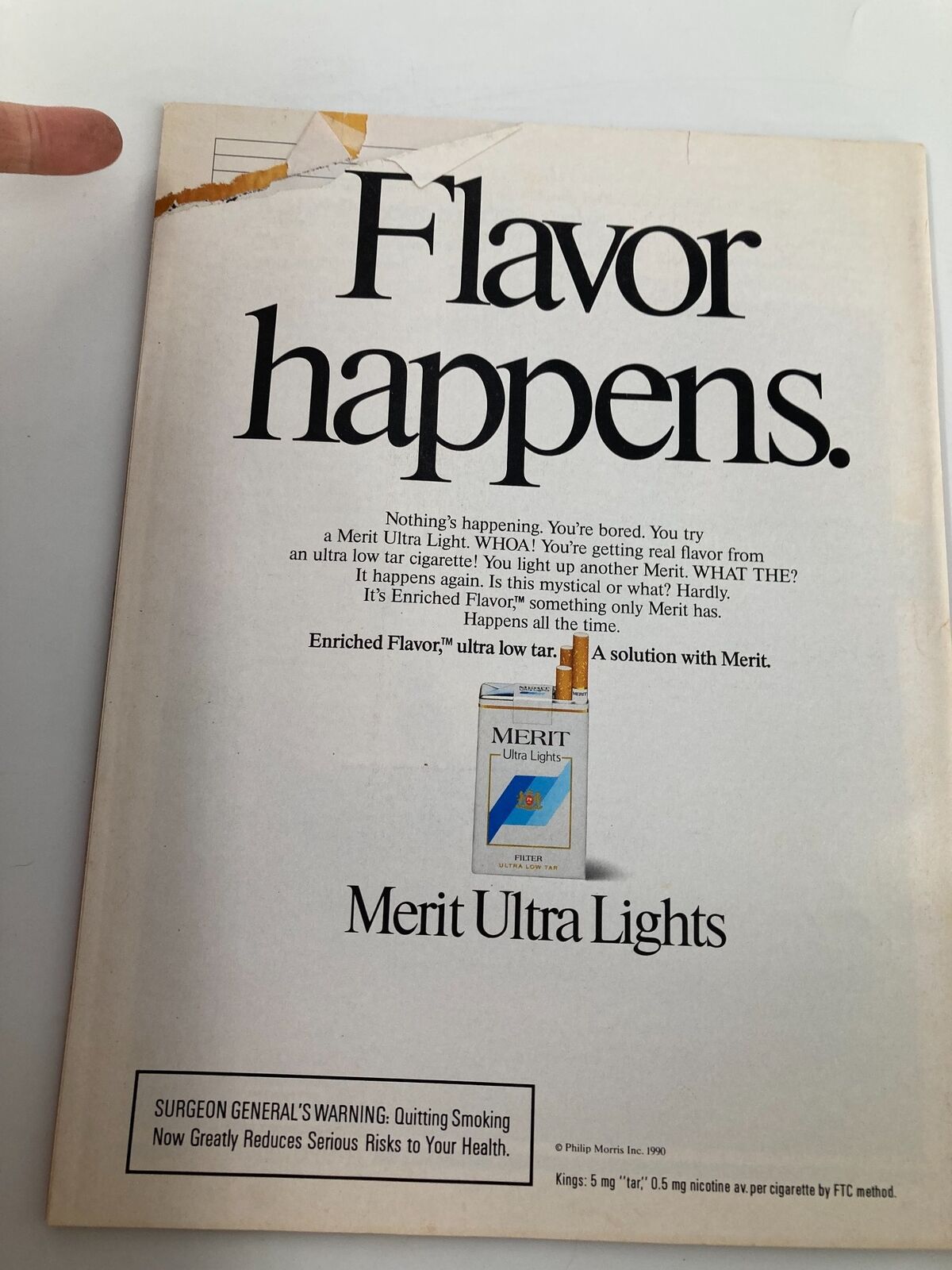 Back cover of VTG Time Magazine March 12 1990 with an advertisement for Merit Ultra Lights cigarettes, showcasing a minimalist design and a warning about health risks associated with smoking.