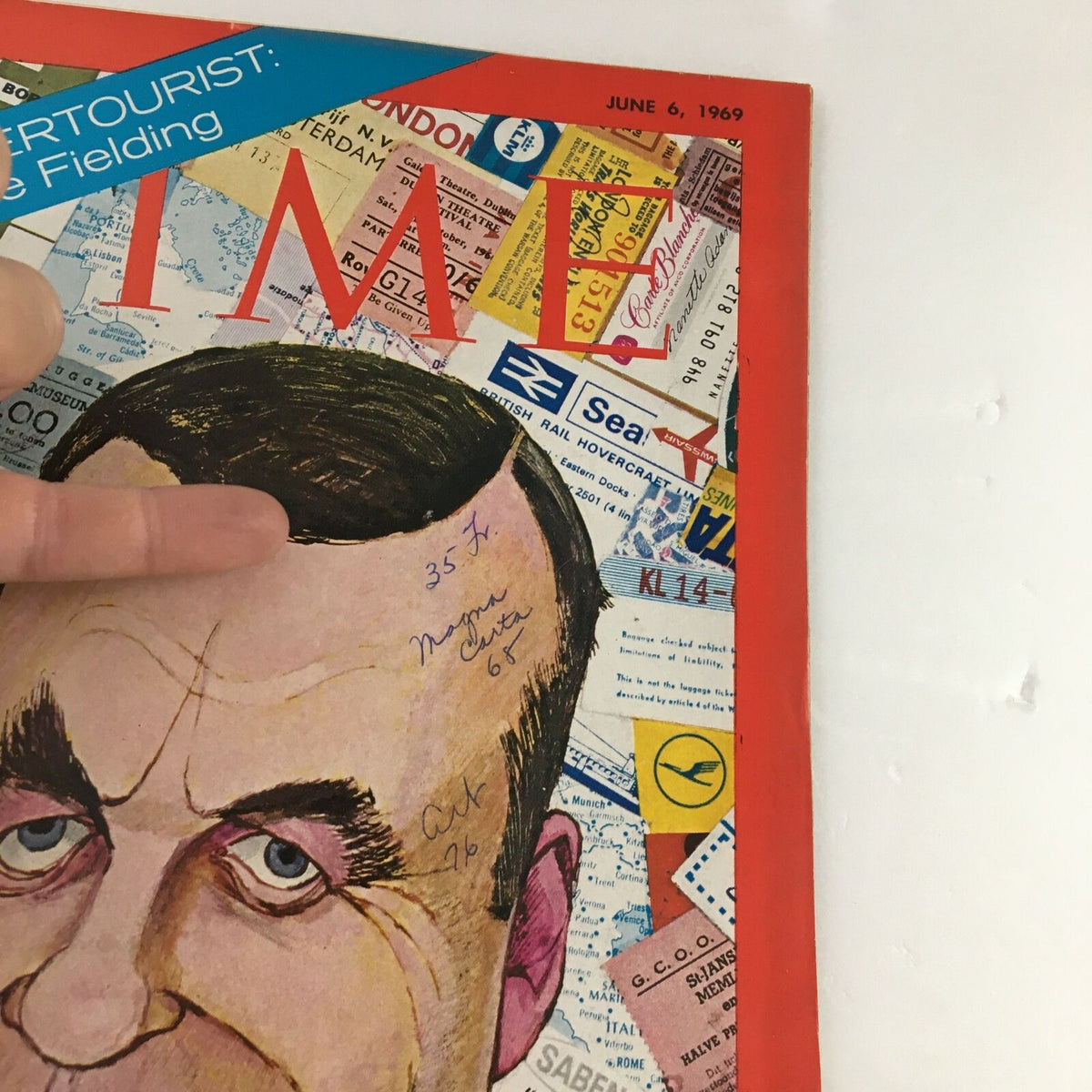 Close-up of the Time Magazine cover from June 6, 1969, showing details of the caricature of Temple Fielding along with handwritten notes and travel ticket designs.