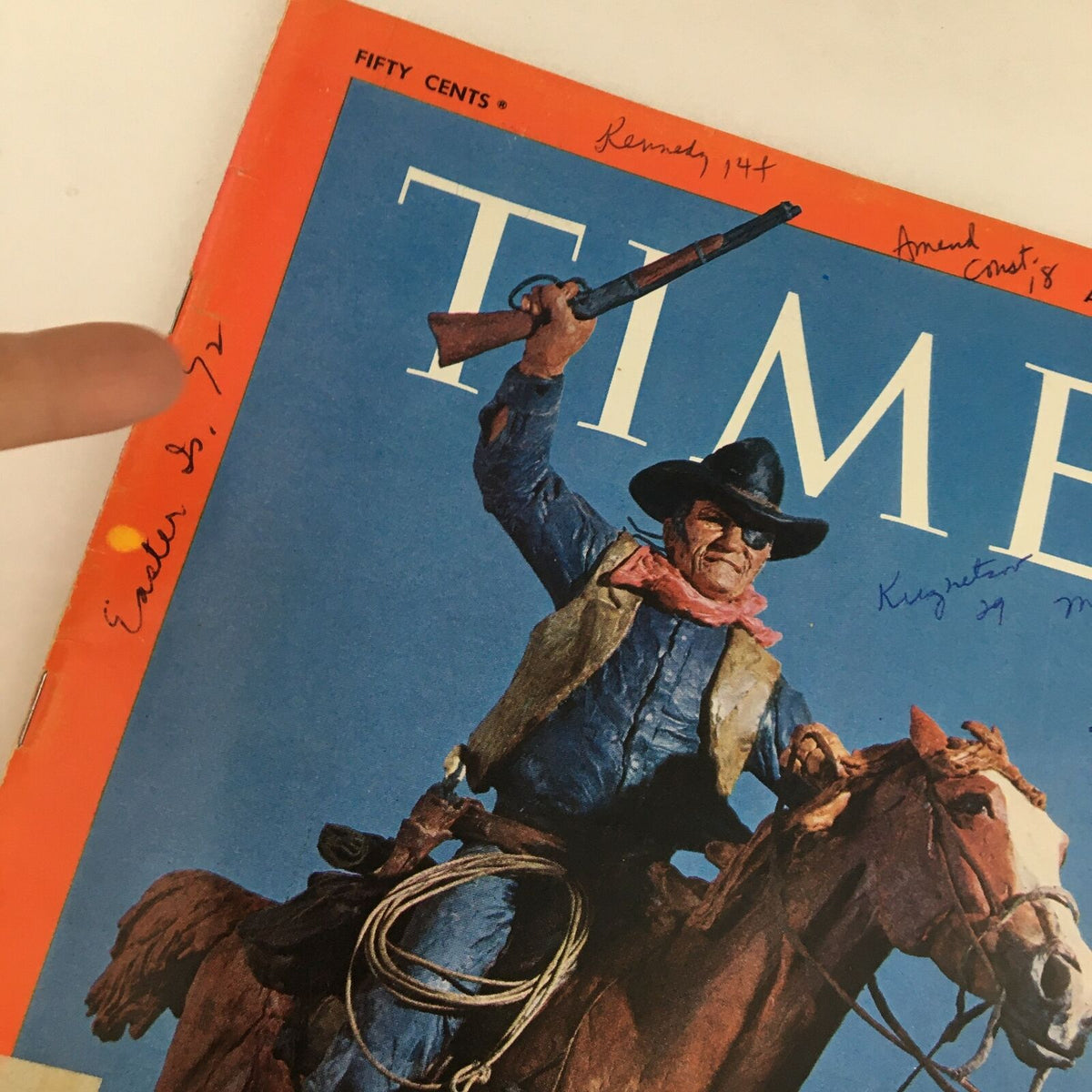 Close-up of Time Magazine August 8 1969 cover with actor John 'Duke' Wayne, highlighting his expression and details of the cover including handwritten notes and vintage design elements.