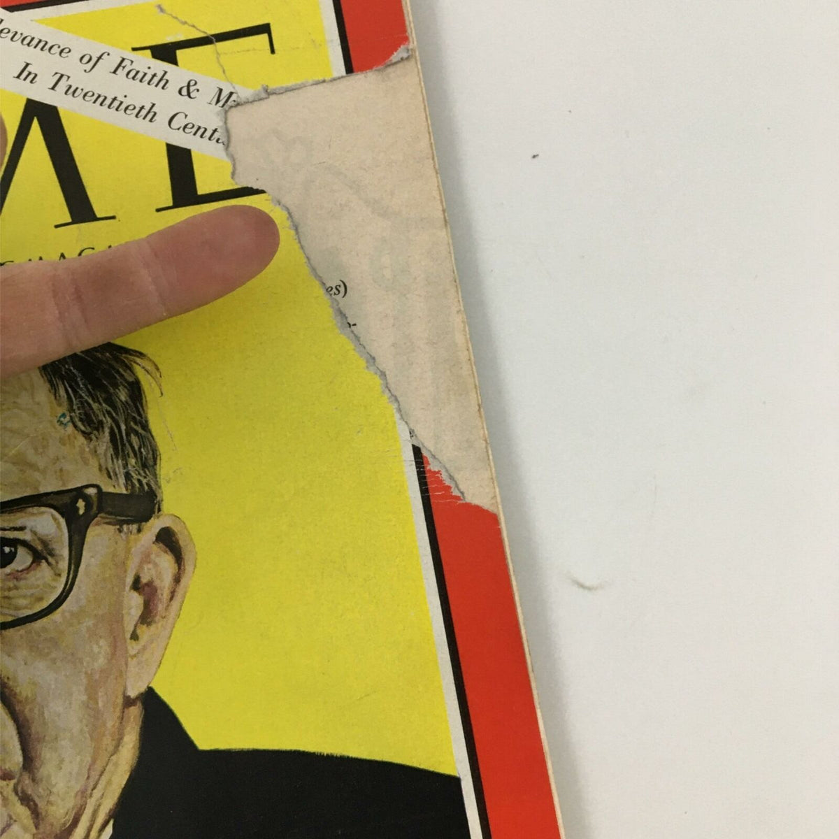 Detail of the cover of the VTG Time Magazine November 11, 1966 showing Bishop Pike, highlighting a tear on the edge of the magazine.