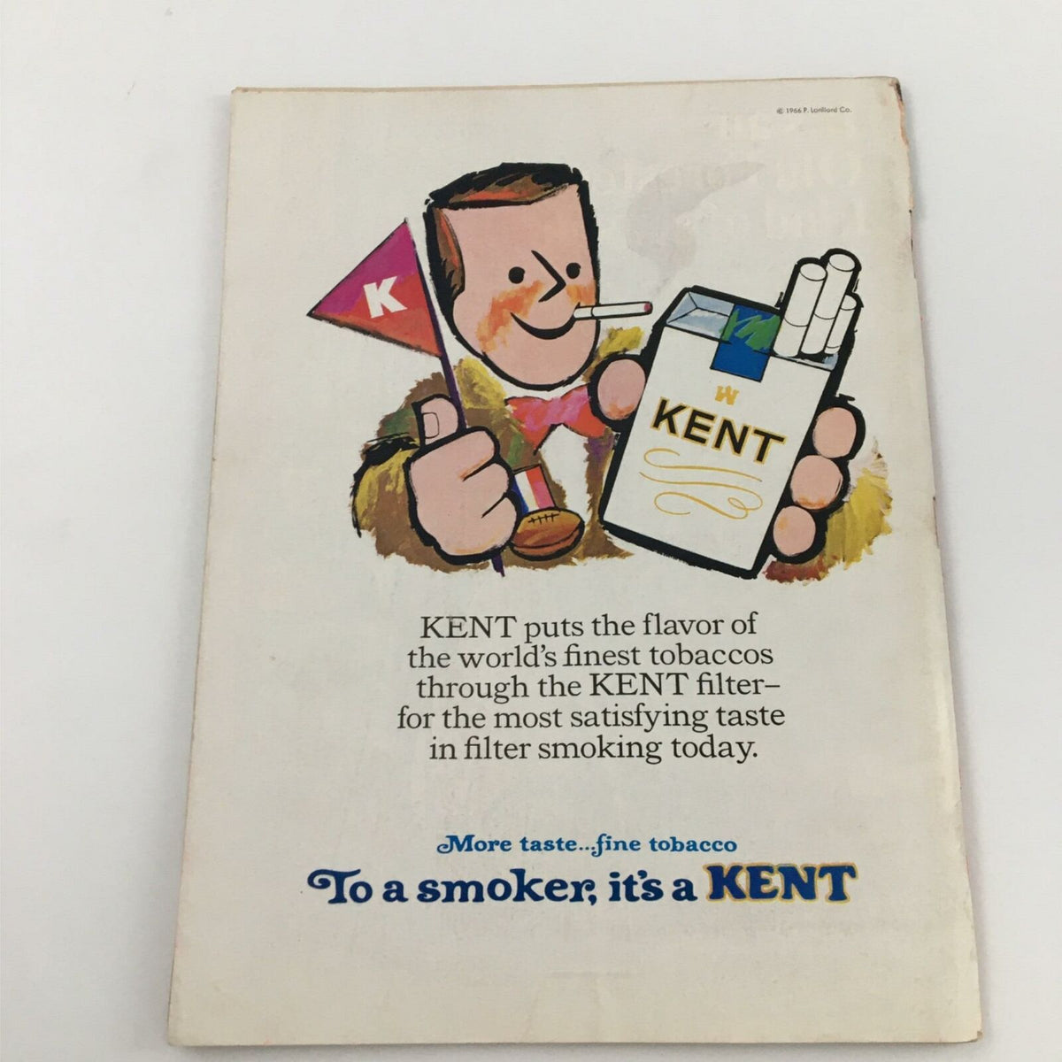 Back cover of VTG Time Magazine November 11, 1966, displaying an advertisement for KENT cigarettes featuring a cartoon character promoting their tobacco. This collectible magazine delves into significant religious discussions of its era.