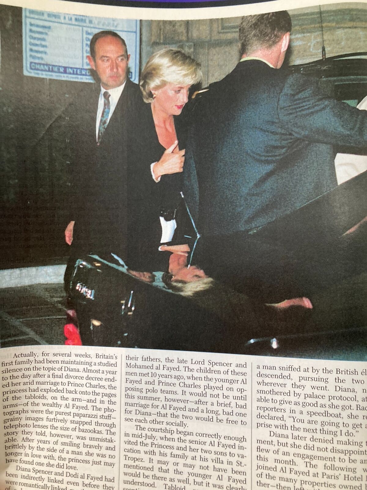 Image from Time Magazine September 8, 1997 capturing Diana, Princess of Wales in a black outfit, entering a car with her security team.
