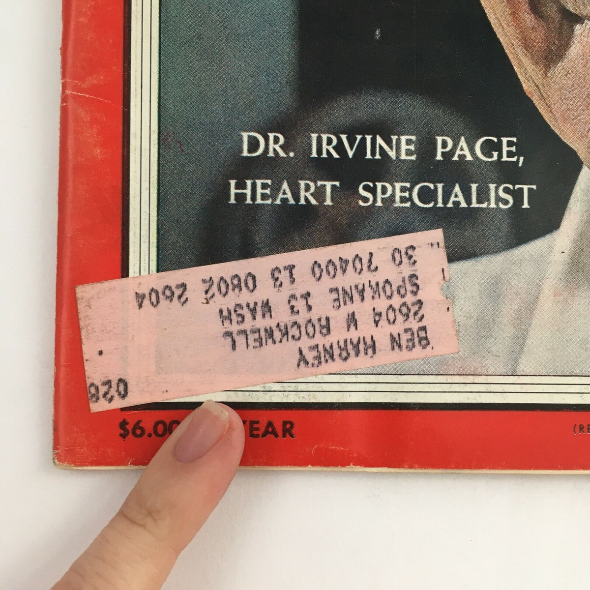 Close-up of the Time Magazine cover from October 31, 1955, highlighting Dr. Irvine Page, Heart Specialist. The image shows a pink address label covering part of the cover.