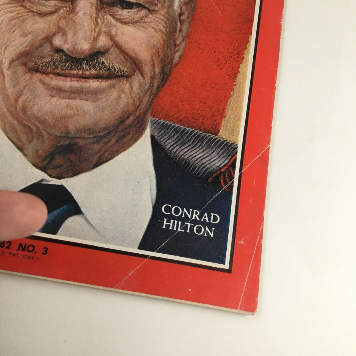 Close-up detail of the cover of Time Magazine July 19 1963 Vol. 82 No. 3 highlighting Conrad Hilton's portrait, emphasizing his role in modern hospitality and the iconic status of this collectible magazine.