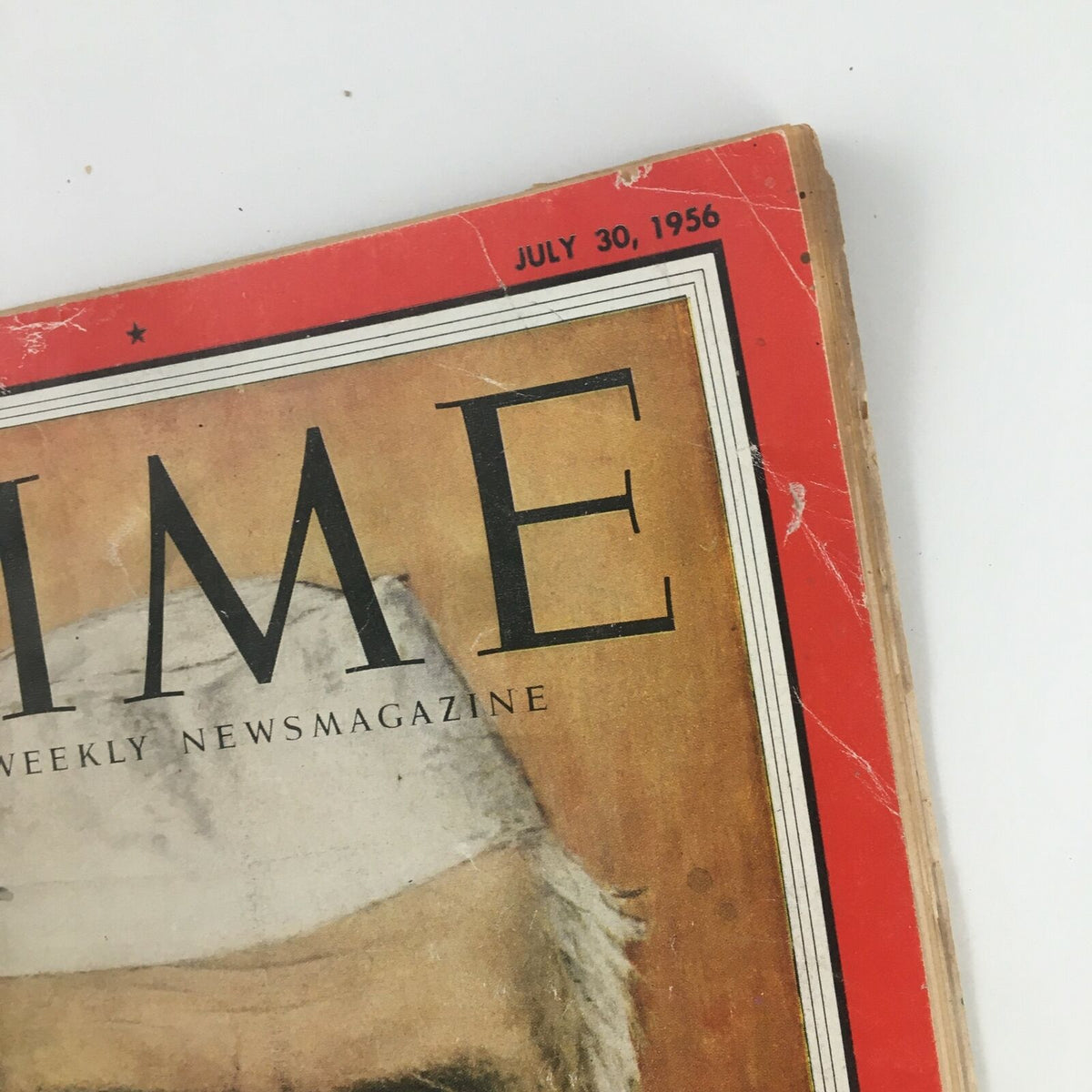Top corner close-up of the July 30, 1956 issue of Time Magazine, highlighting the title and date with visible wear, featuring India's Premier Jawaharlal Nehru.