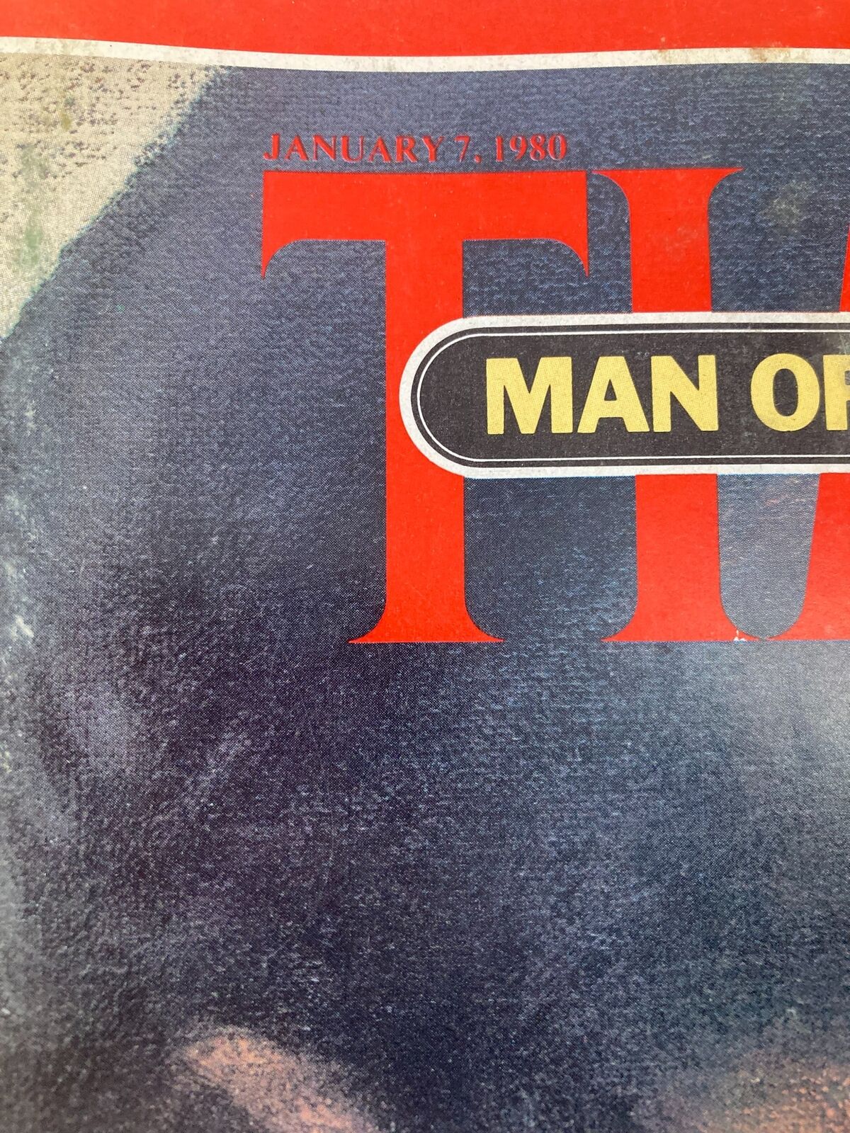 Close-up of the vintage Time Magazine from January 7, 1980, showcasing the title and date, featuring Ayatullah Khomeini as the Man of the Year.
