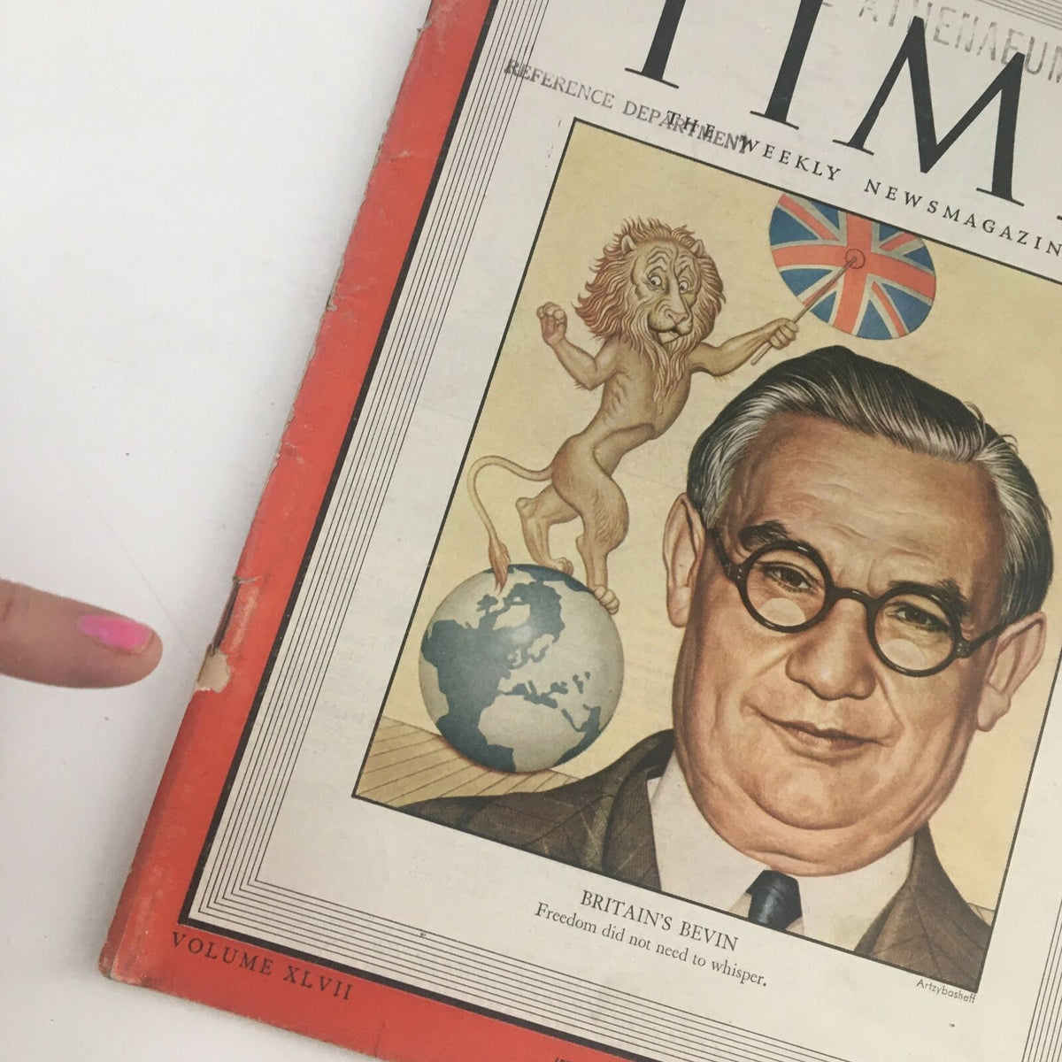 Close-up of Time Magazine February 18, 1946, Vol 47 #7 showing details of the cover art with Trade Union Leader Ernest Bevin, a globe, and a lion, emphasizing vintage elements.