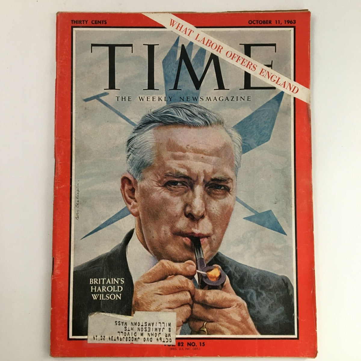Time Magazine cover from October 11, 1963 featuring Sir Harold Wilson, Prime Minister of the United Kingdom. The image showcases a portrait of Wilson smoking a pipe with a backdrop of blue arrows. This collectible issue, Vol 82 No 15, captures a significant moment in British politics.