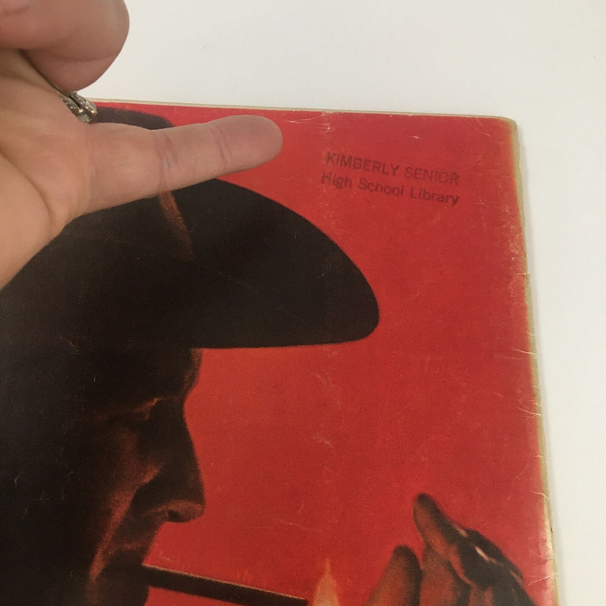 Back cover of 'Time Magazine August 28 1964' with a close-up of a library stamp and image of a man wearing a hat.