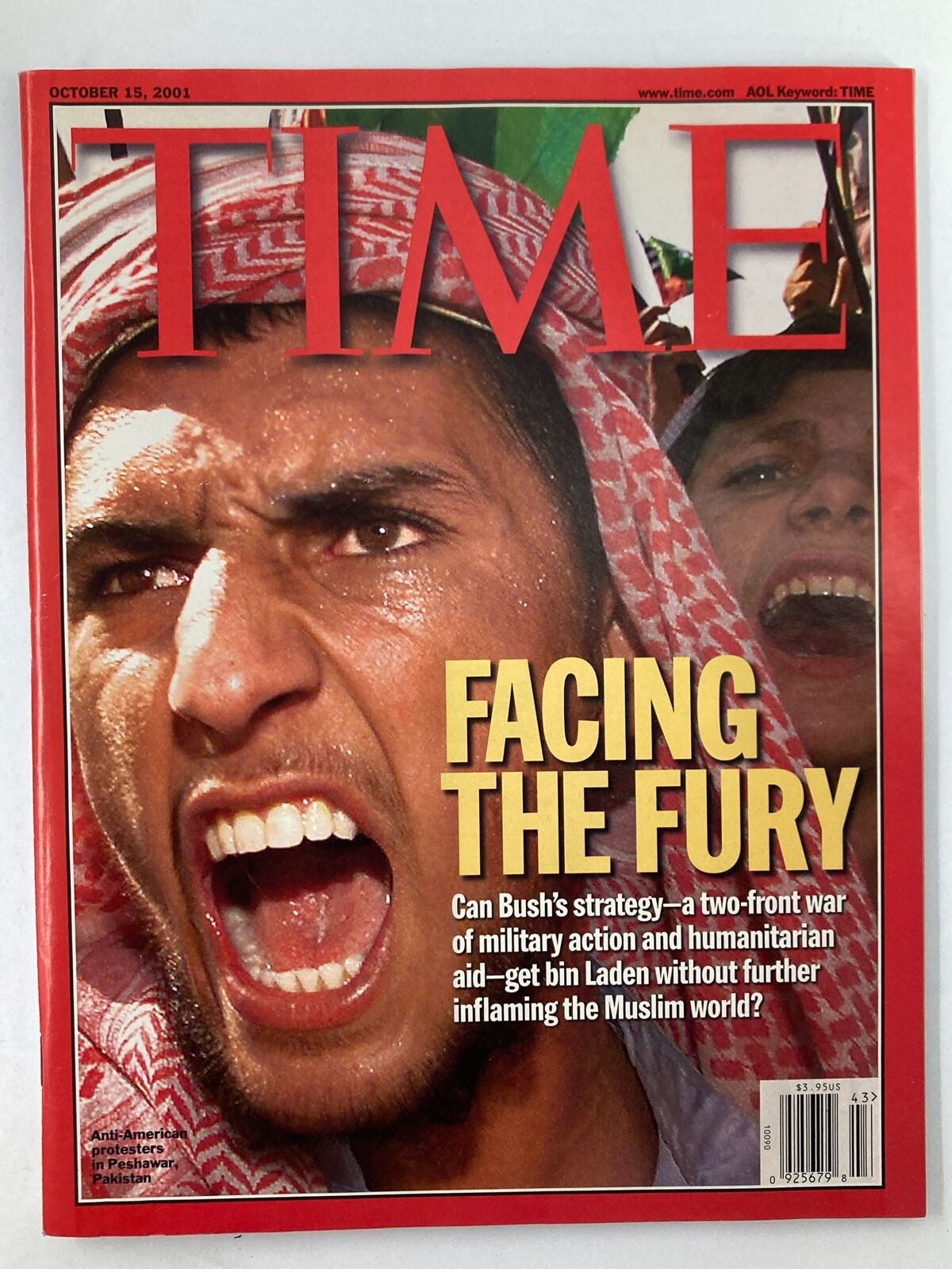 Time Magazine cover from October 15, 2001, featuring George Bush with the headline 'Facing The Fury' highlighting the military and humanitarian strategy in response to 9/11.