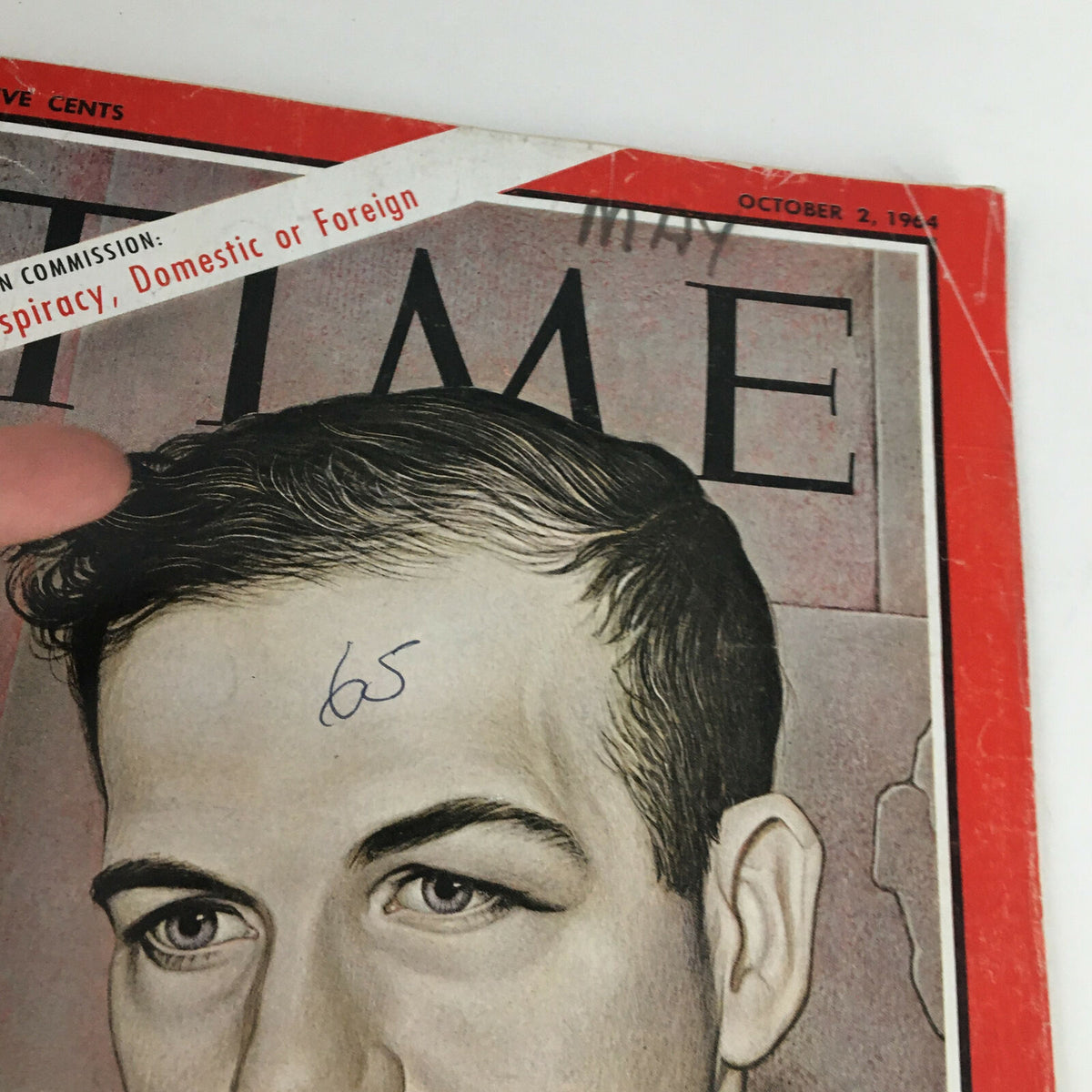 Close-up of Time Magazine cover from October 2, 1964, showing Lee Harvey Oswald with a handwritten note.