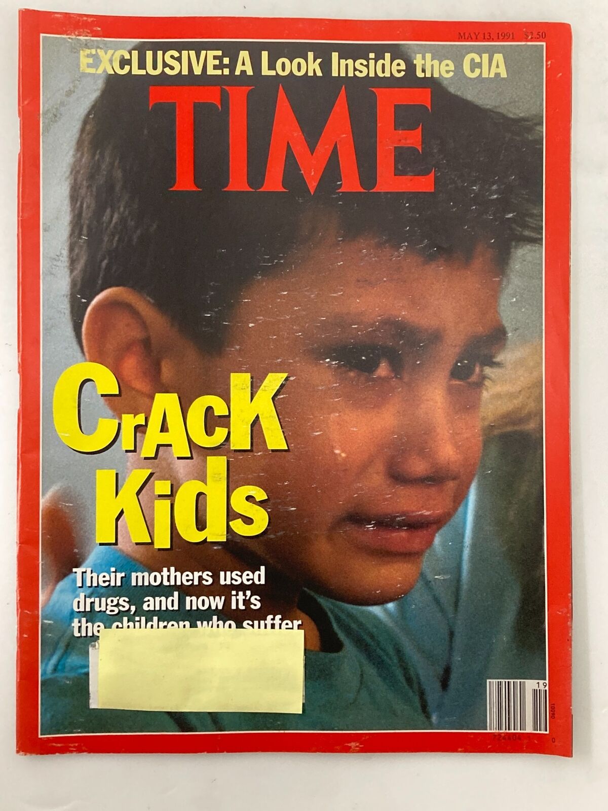 Time Magazine cover from May 13, 1991, featuring the headline 'Crack Kids' and an emotional portrait of a child, addressing the impact of drug addiction on children and including an exclusive look inside the CIA.