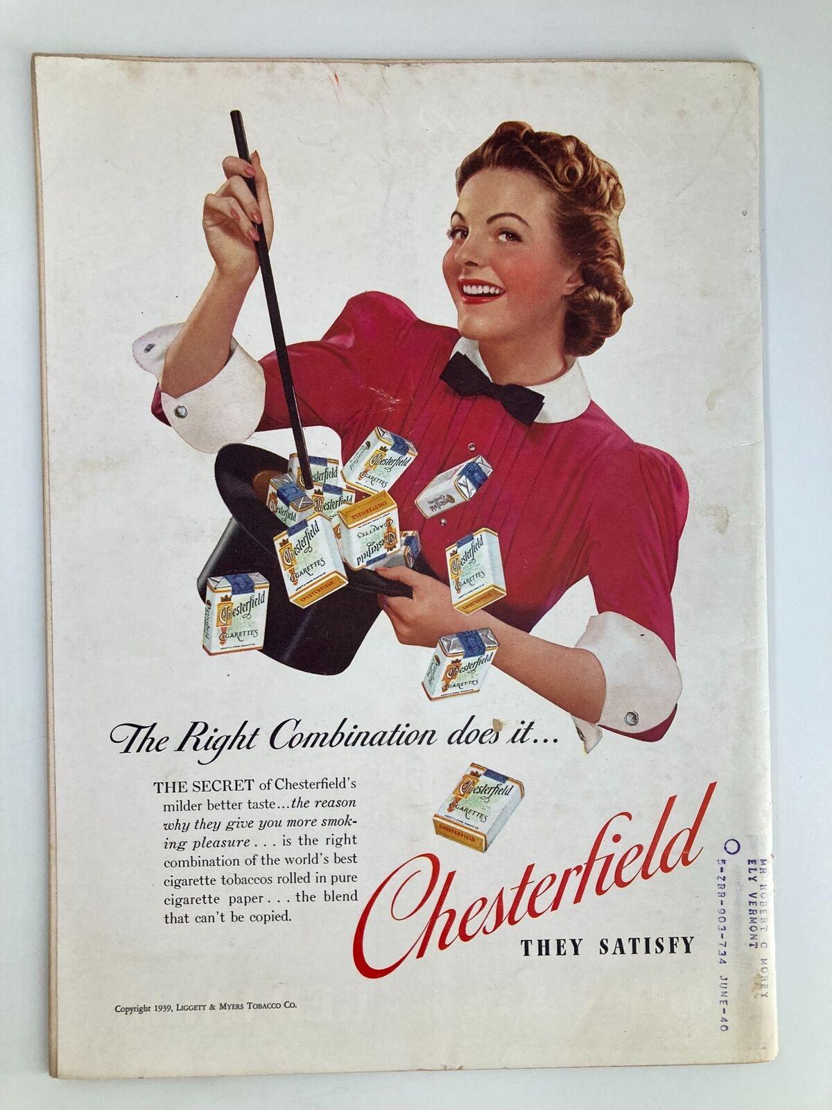 Back cover of VTG Time Magazine April 3 1939 Vol 33 No. 14 featuring a vintage Chesterfield cigarette advertisement with a smiling woman in a red dress, promoting the brand's unique blend.