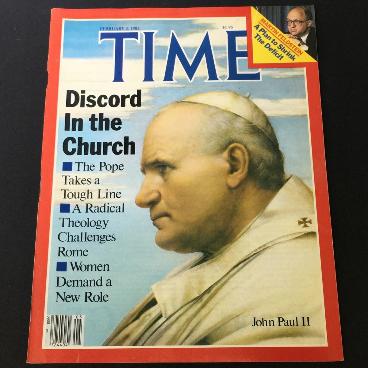 Vintage Time Magazine cover from February 4, 1985, featuring Pope John Paul II with the headline 'Discord In the Church,' discussing significant topics related to the Pope's influence and religious challenges.