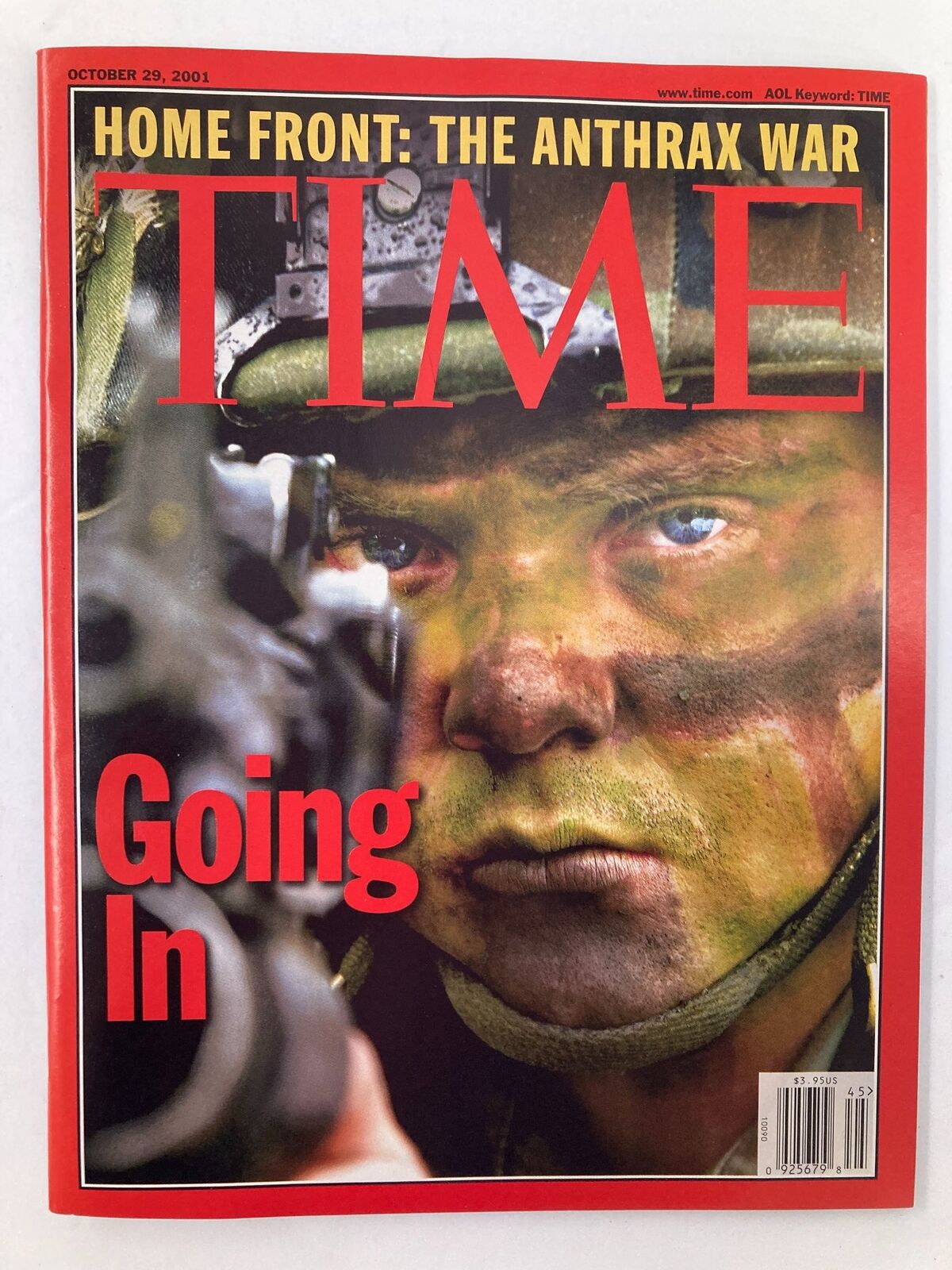 Cover of Time Magazine, October 29, 2001, featuring the theme 'Home Front: The Anthrax War' with a soldier's face in camouflage paint, titled 'Going In'.