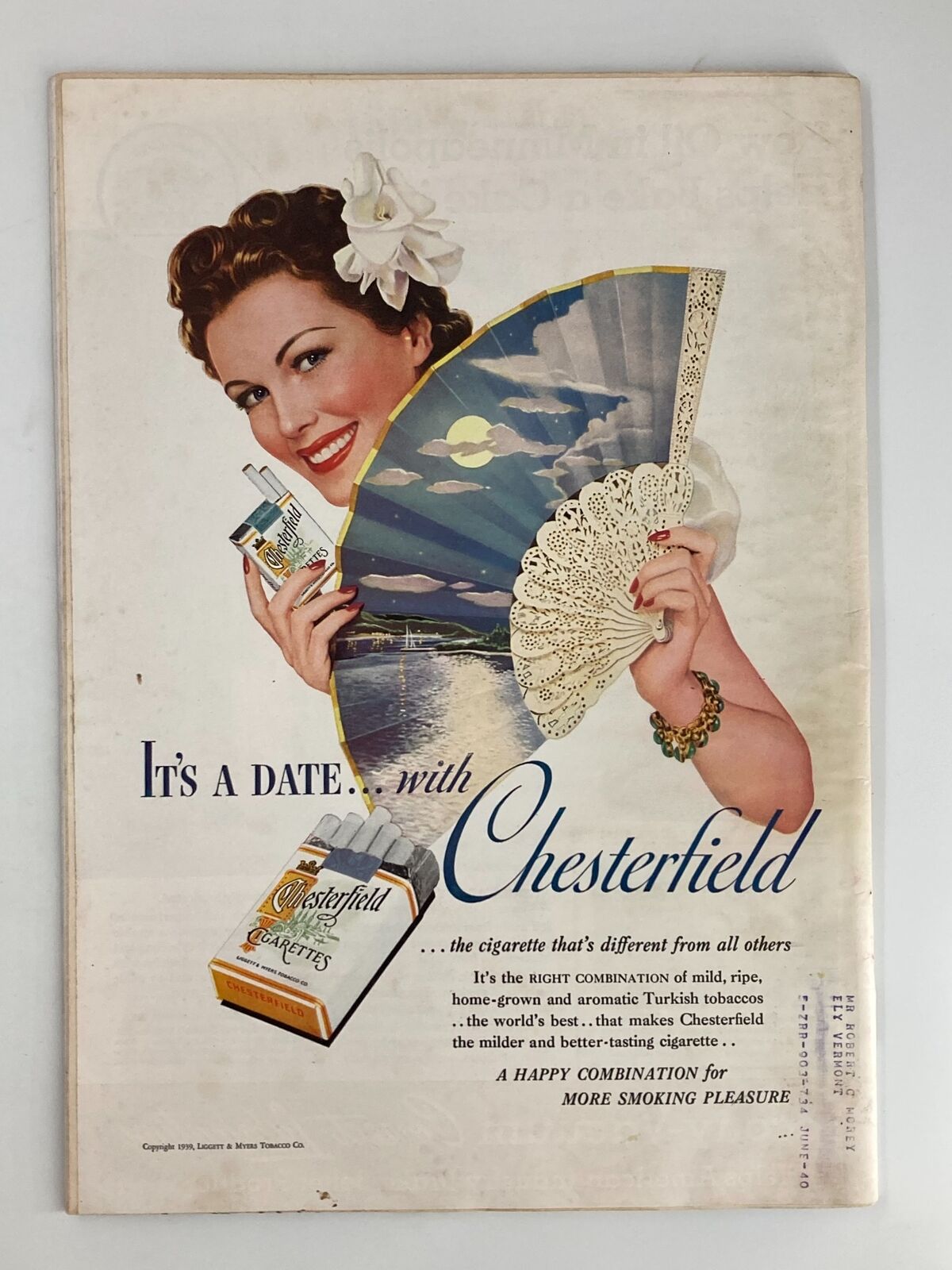 Vintage advertisement featuring a glamorous woman with a fan, promoting Chesterfield cigarettes, from the VTG Time Magazine August 21 1939 edition.