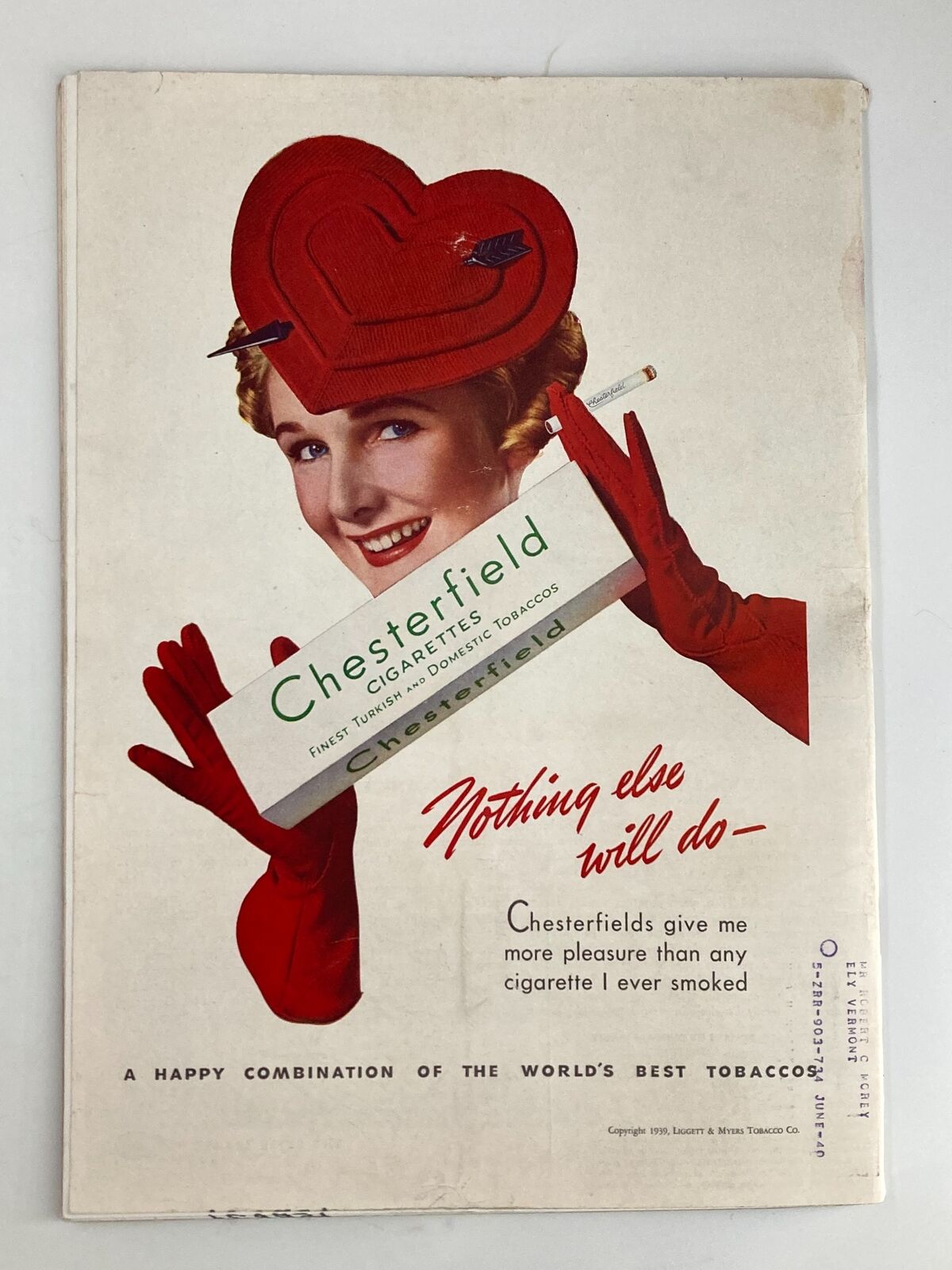Vintage advertisement for Chesterfield cigarettes from the February 6, 1939 issue of Time Magazine, featuring a woman in a heart-shaped hat promoting the brand.