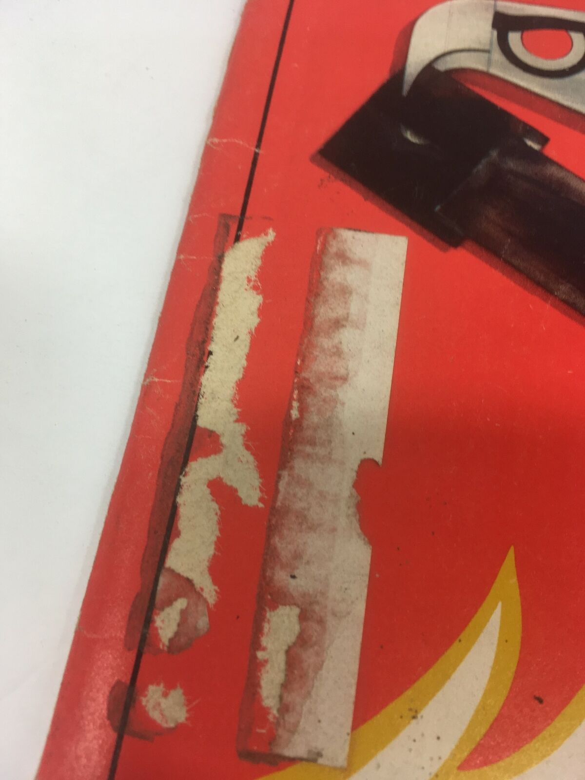 Detail shot of the Time Magazine cover from January 8, 1973, showing wear and tear with remnants of a label, emphasizing the vintage quality of the issue.