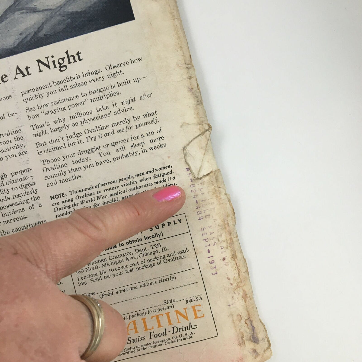 Detailed view of the back cover of the Time Magazine February 20, 1933, showing an advertisement for Ovaltine with additional information and visible wear.