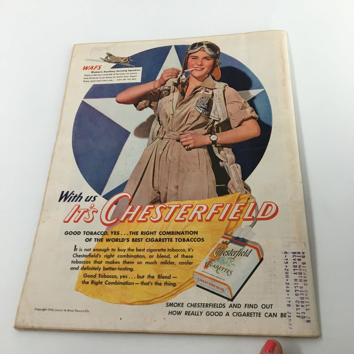 Vintage advertisement featuring a woman in a military-style outfit promoting Chesterfield cigarettes, associated with the VTG Time Magazine October 11 1943 Vol. 42 No. 15 Himmler Police Chief of Nazi.