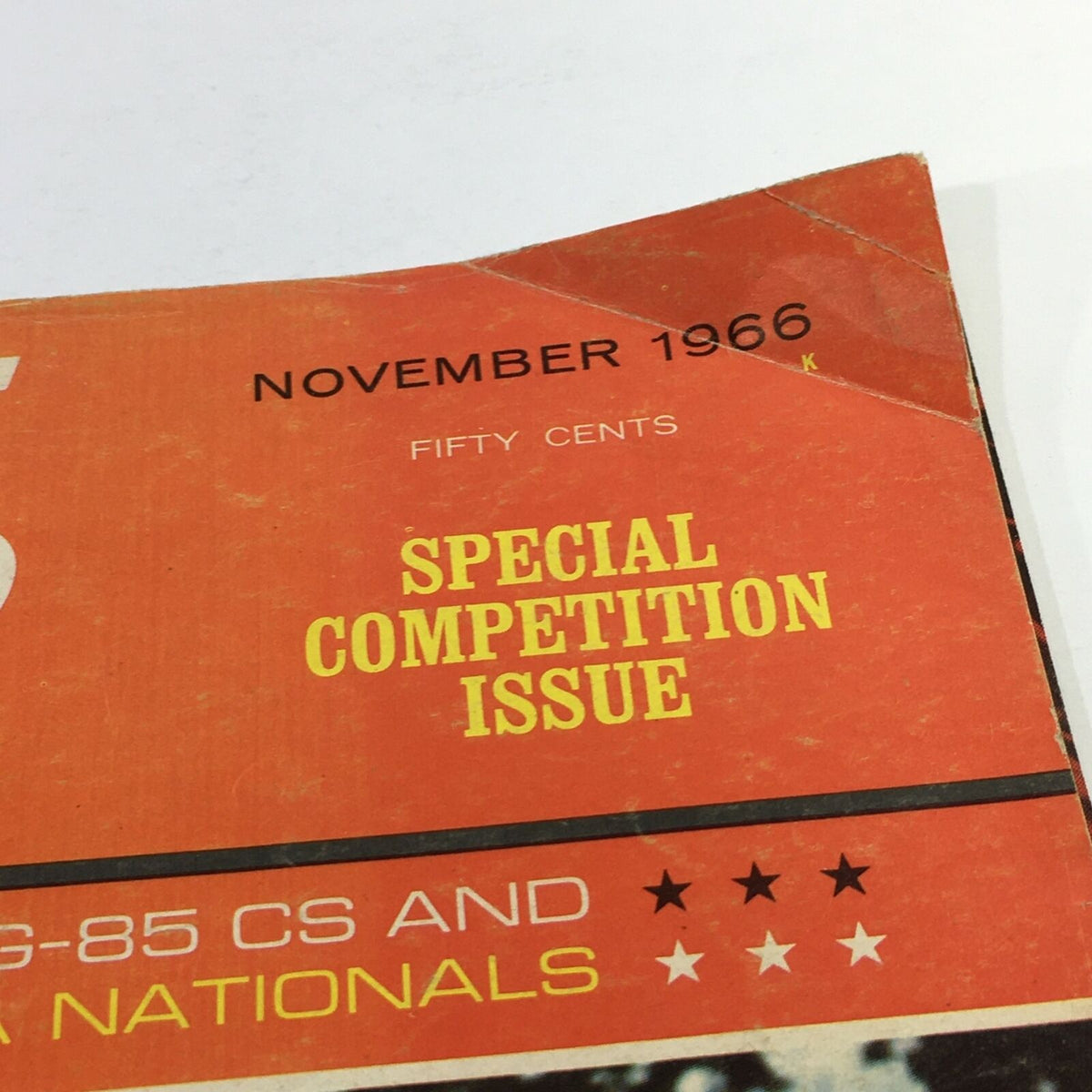Close-up of the top section of VTG Cycle World Magazine November 1966 showing the special competition issue label and publication date.