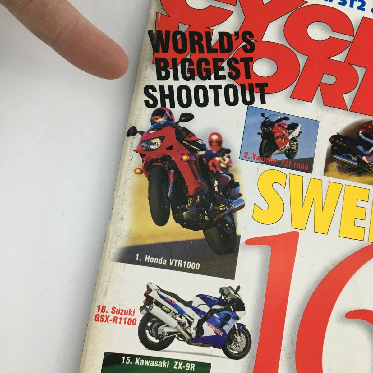 Close-up of Cycle World Magazine July 1997 cover showcasing the Honda VTR1000 in action, part of the 'World's Biggest Shootout' feature, alongside other featured motorcycles like the Suzuki GSX-R1100.