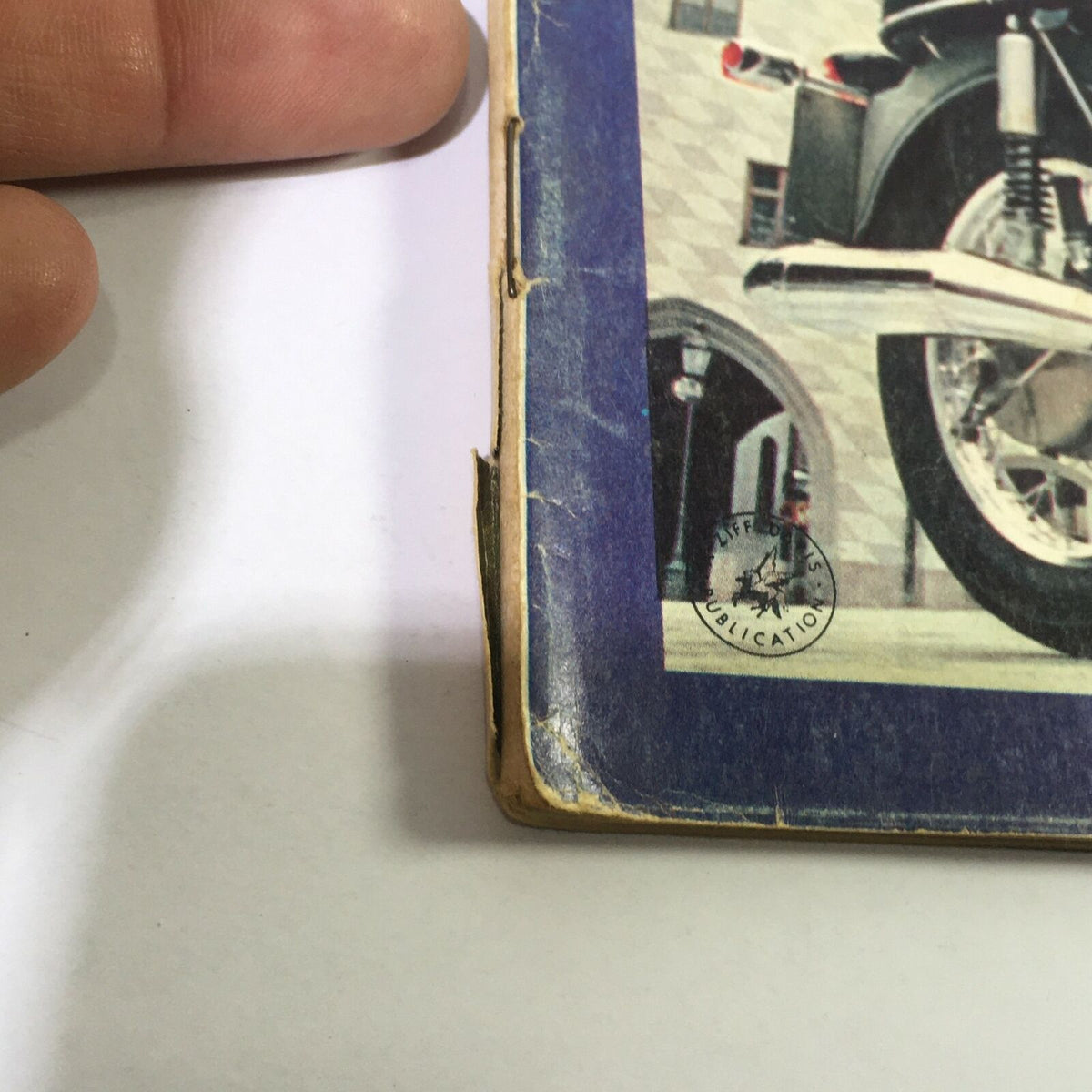 Close-up detail of the edge of VTG Cycle Magazine November 1969, showing minor wear on the cover.