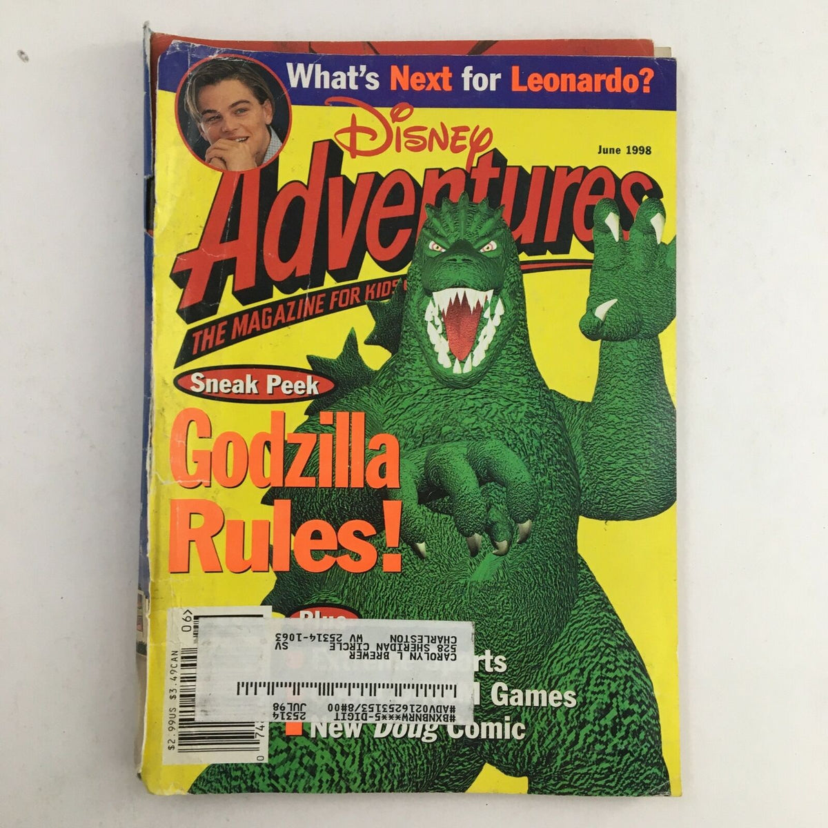 Disney Adventures Magazine June 1998 featuring Godzilla on the cover with the text 'Godzilla Rules!' and a sneak peek of Leonardo DiCaprio.